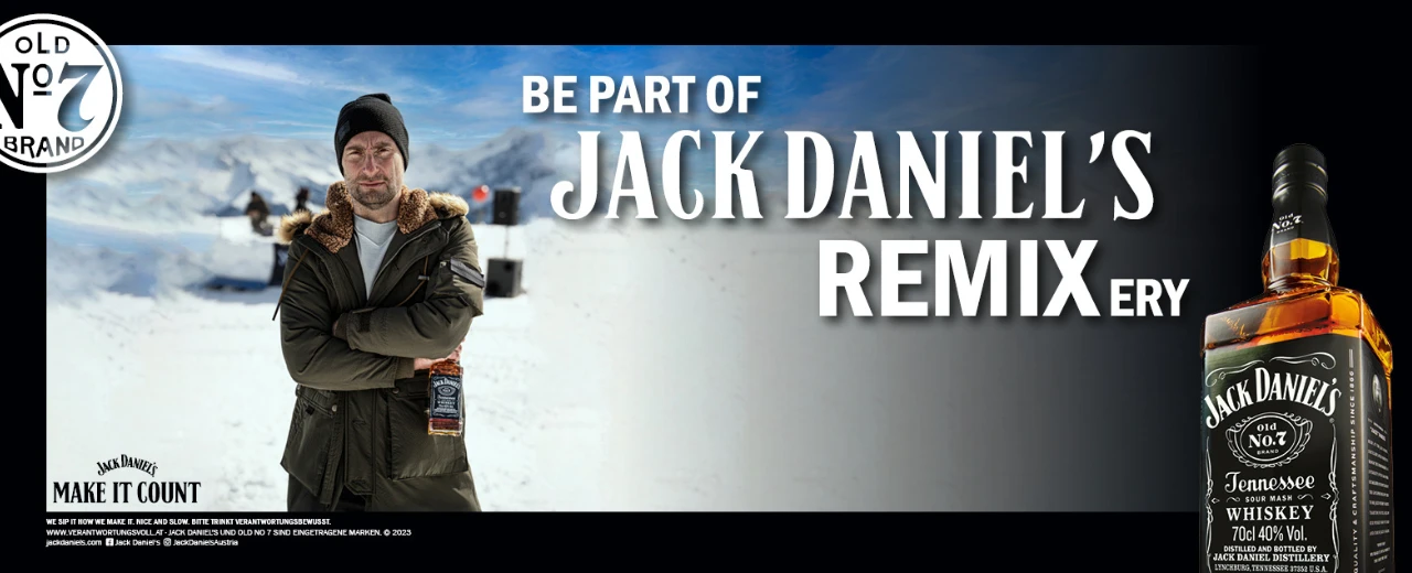 © Jack Daniels Werbebanner: Mann mit Jack Daniel's vor winterlicher Kulisse. 'Be Part of Jack Daniel's Remixery'