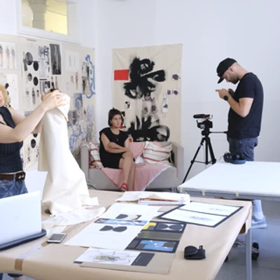 BEHIND THE SCENES