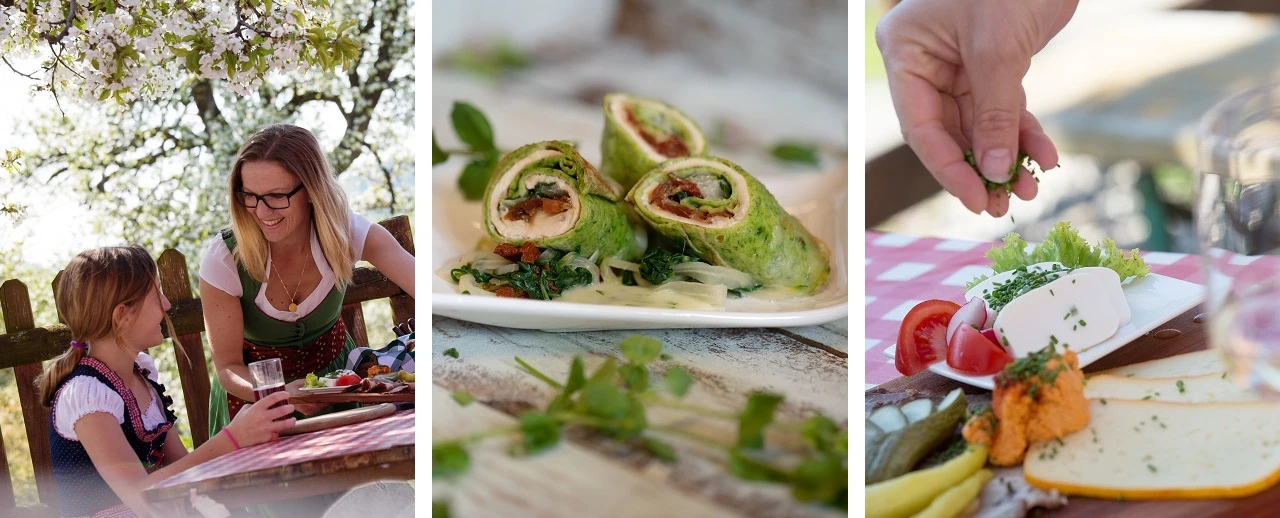 © Moststraße Mutter und Tochter genießen Spinat-Wraps im Freien.  Leckeres Essen, Familienzeit, Sommer.