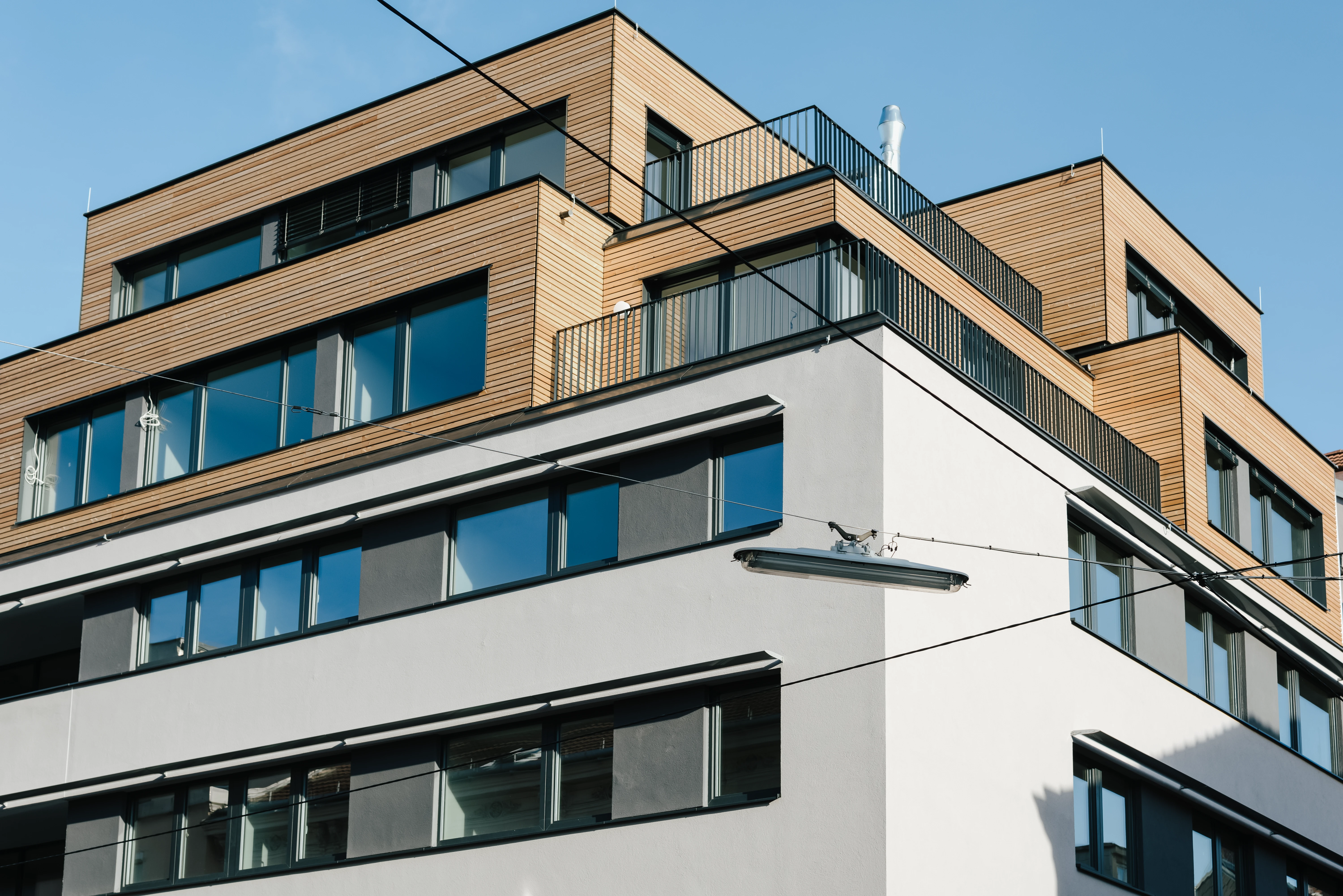 Fassade Wohninvestment mit Holz