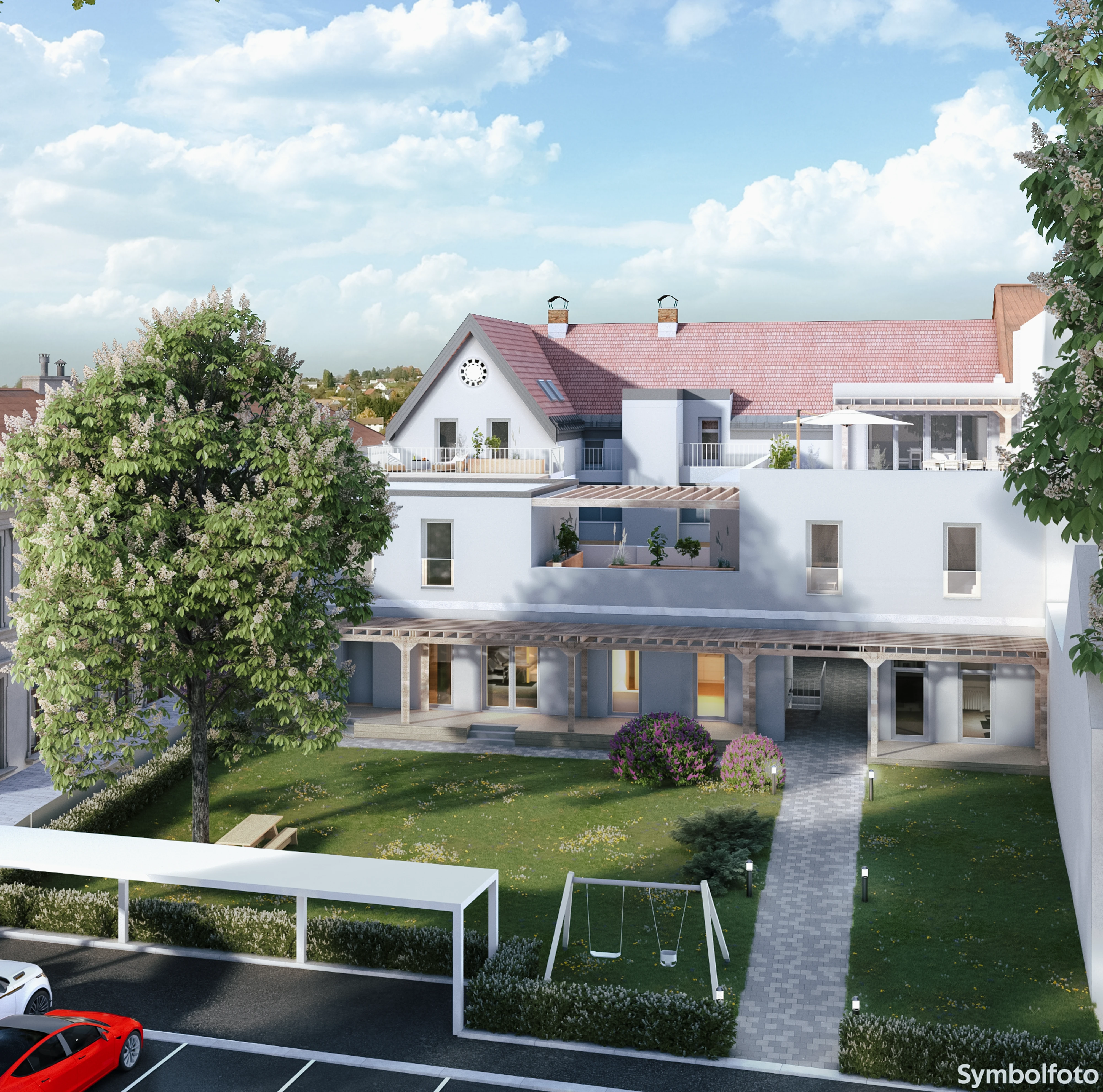 Modernes Wohninvestment mit Gartenanlage inklusive Schaukel und mehrstöckigen Terrassen