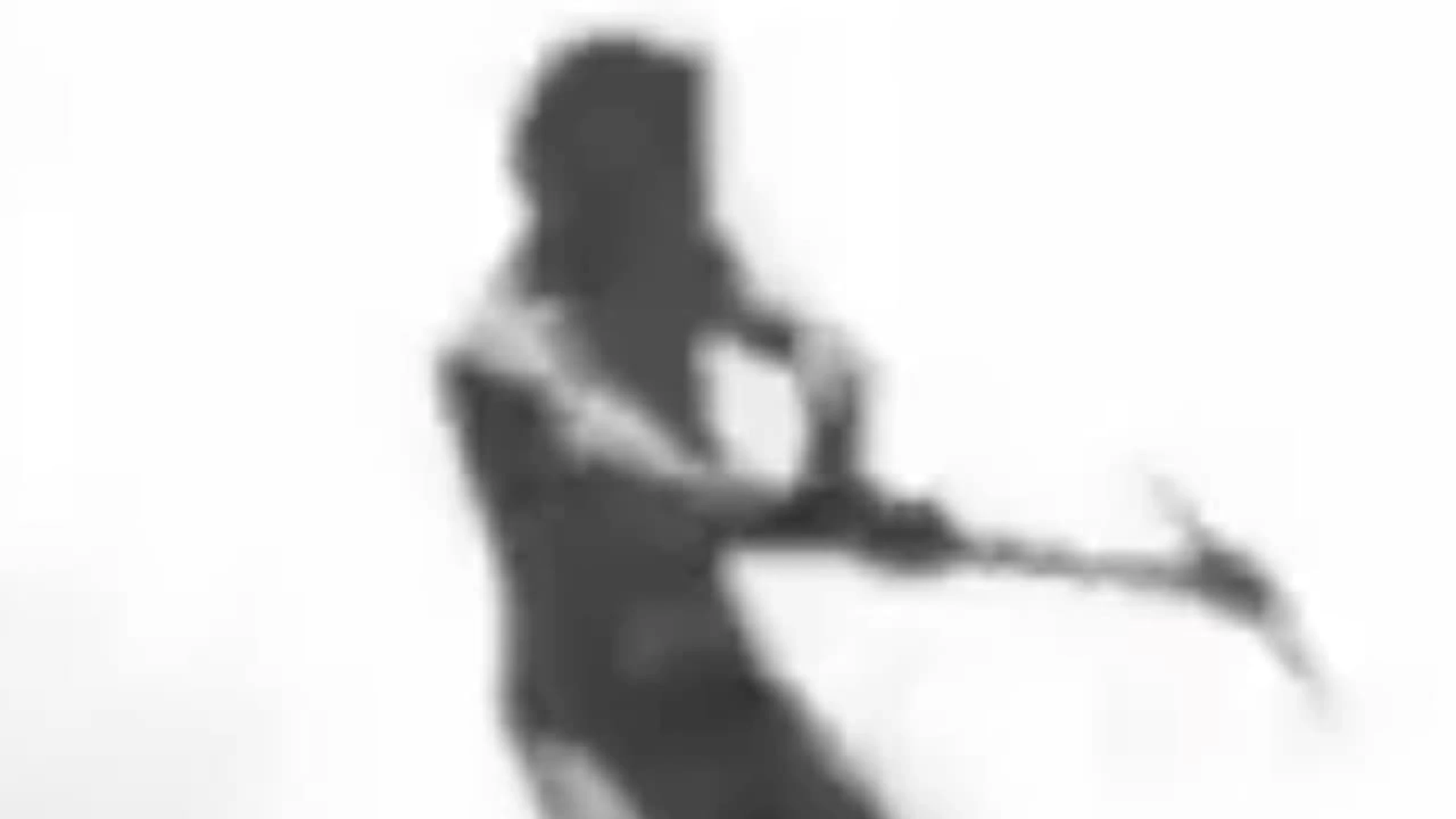 Athlete Swinging a Pick