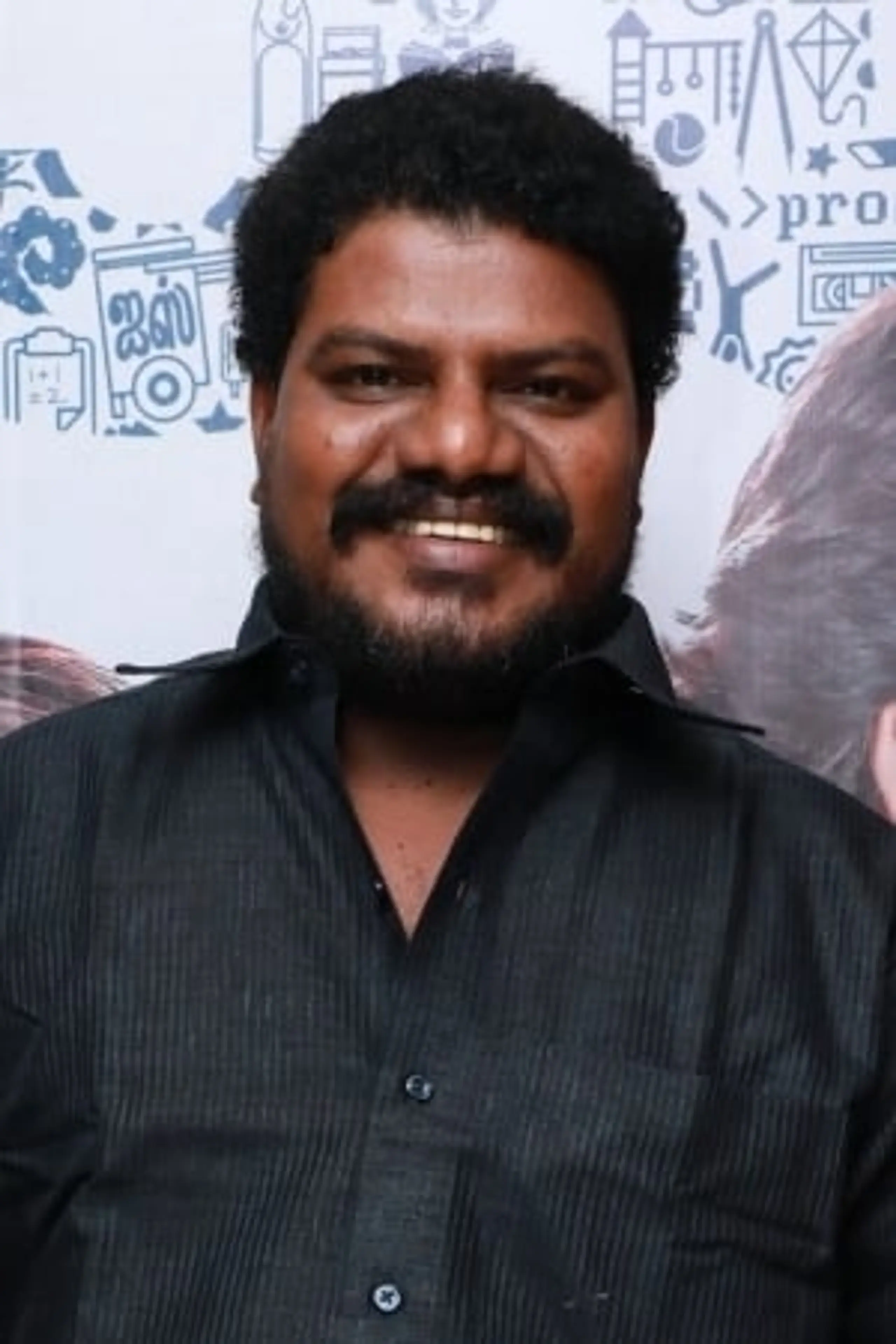 Foto von Aadukalam Murugadoss