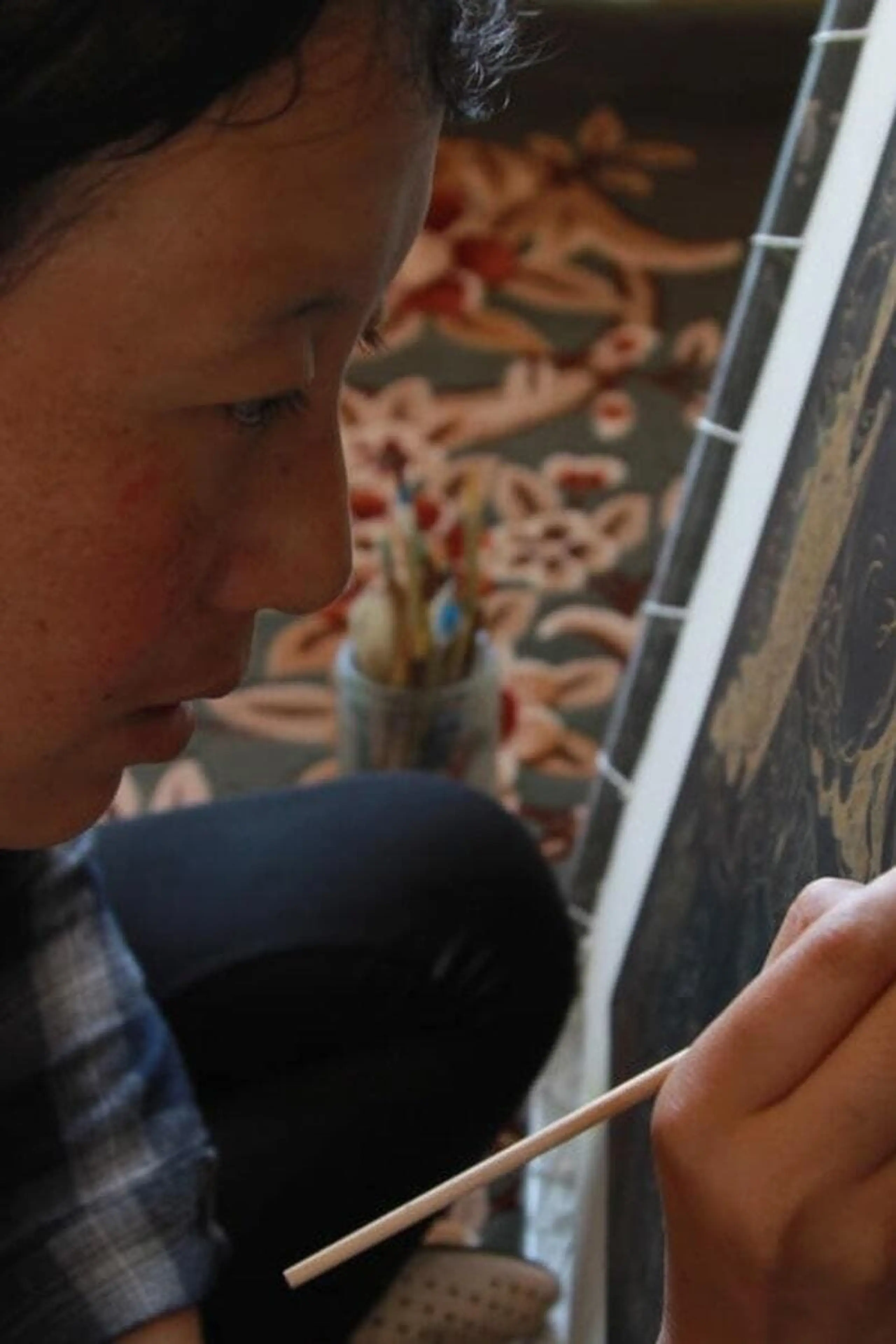 A Woman Who Paints Thangkas