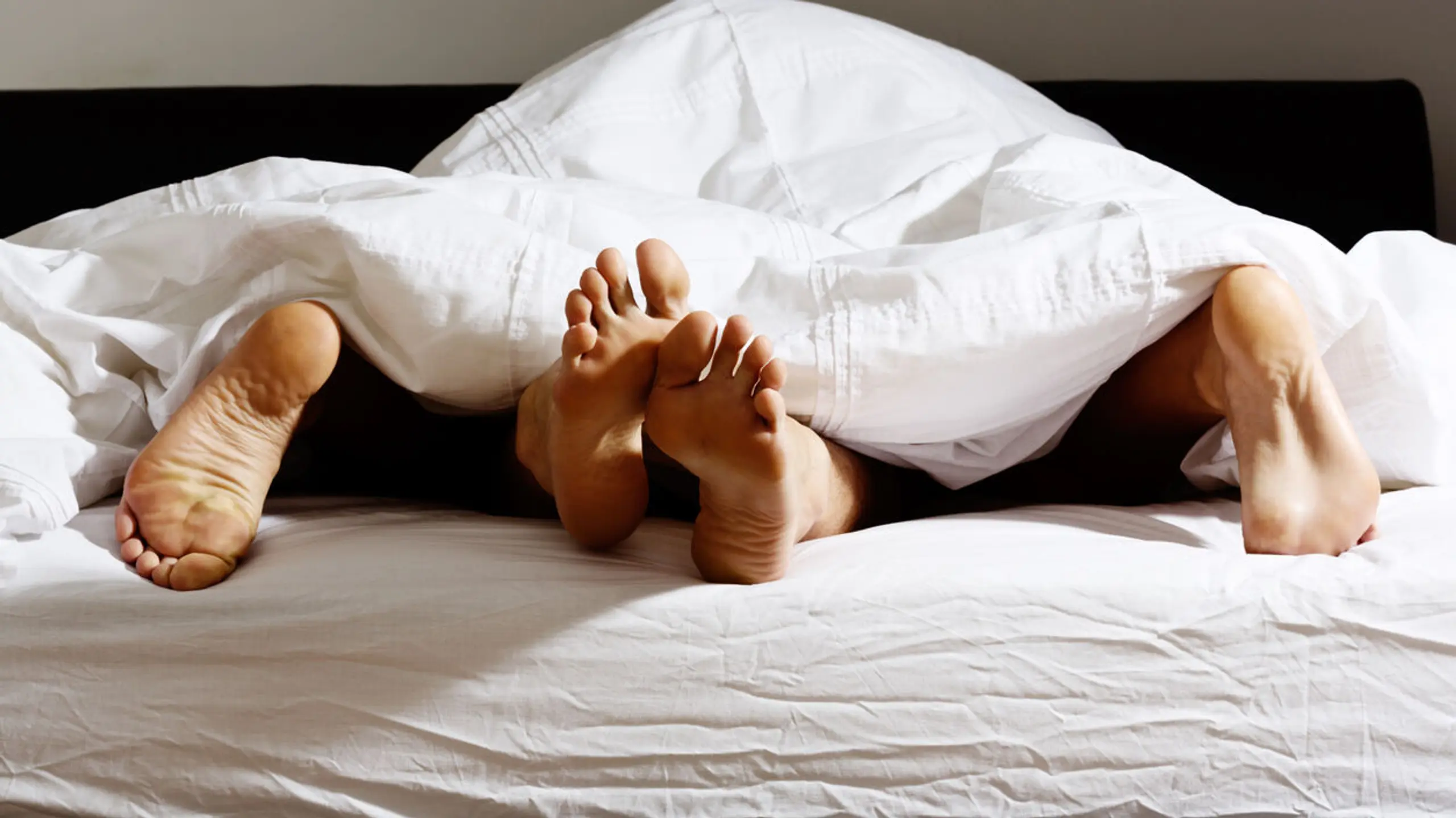 Orgasmus - Pärchen im Bett