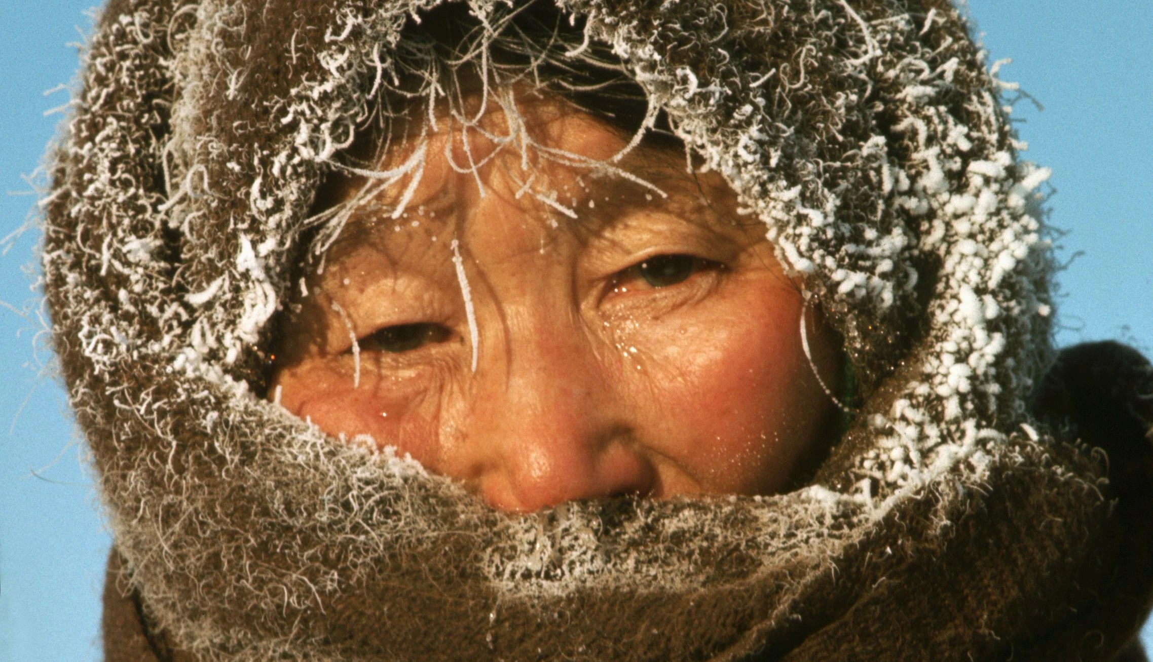 1966, Oymyakon, Russia --- Yakut Woman Outside at Minus 50 Degress Fahrenheit --- Image by © Dean Conger/Corbis