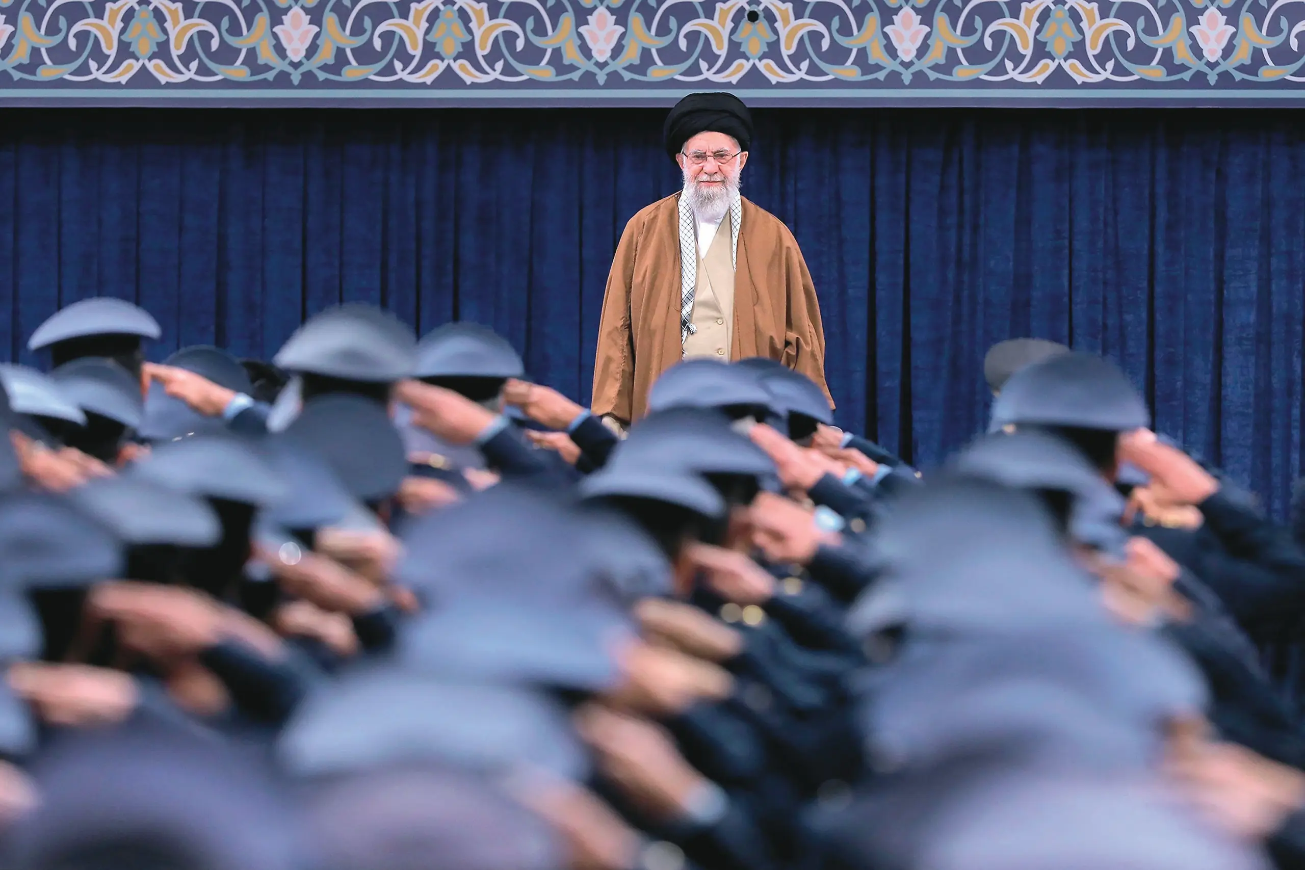 * This handout picture released by the office of Iran's Supreme Leader Ayatollah Ali Khamenei shows him standing before members of Iran's air force in Tehran on February 7, 2025. Iran's supreme leader Ayatollah Ali Khamenei