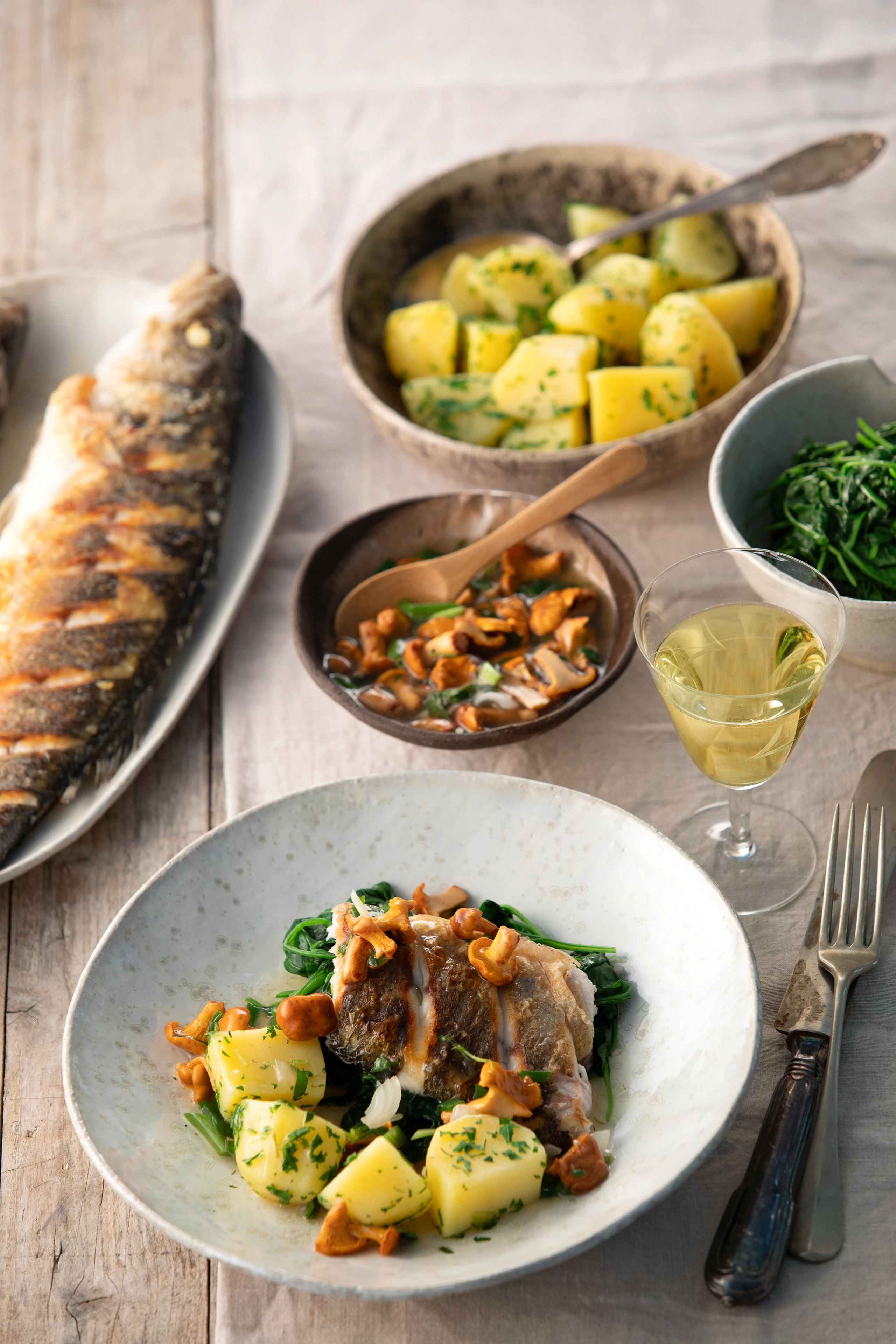 Branzino mit Eierschwammerlfond