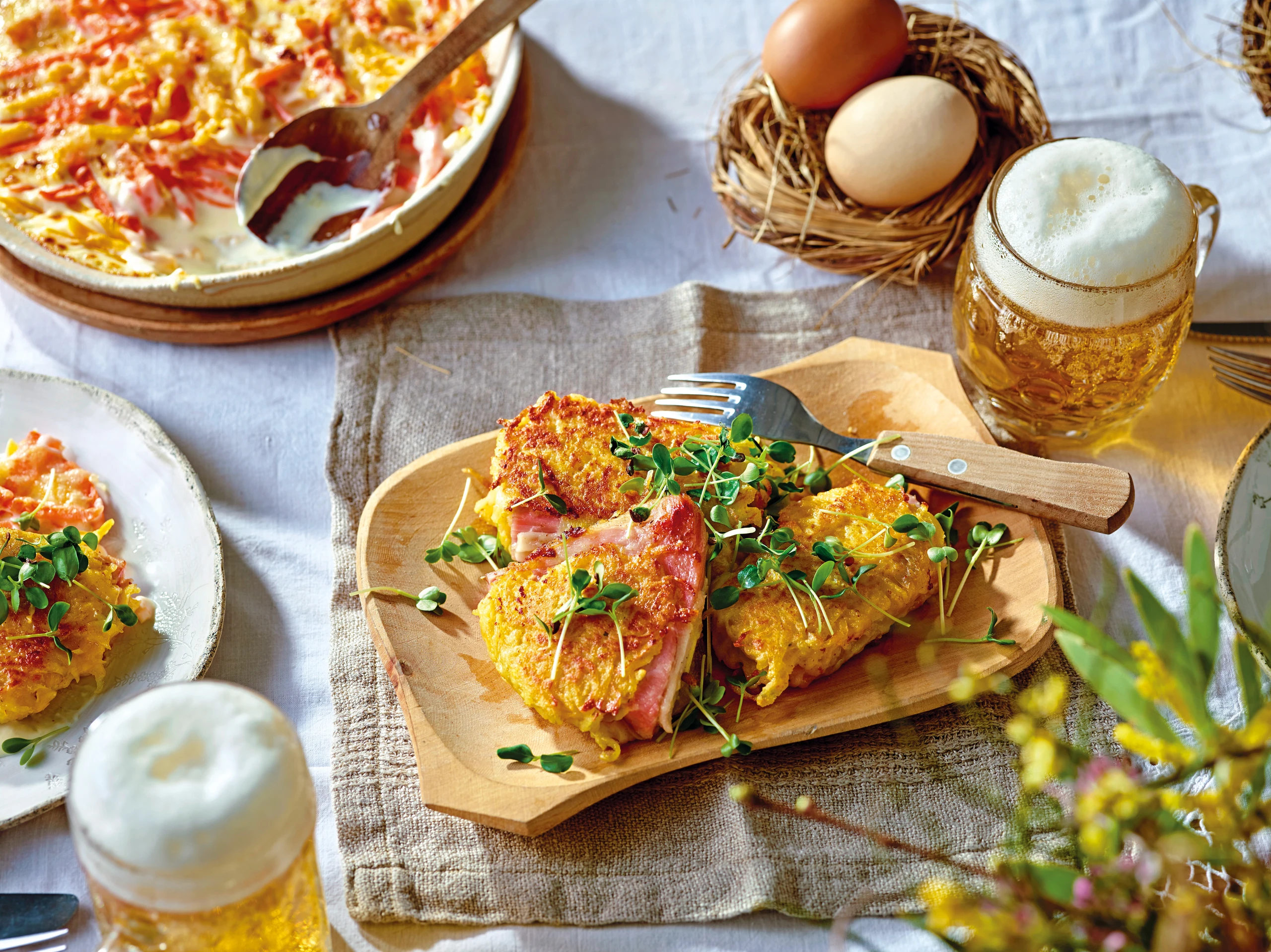 Schinkensteaks in der Erdäpfelkruste mit Gemüsegratin