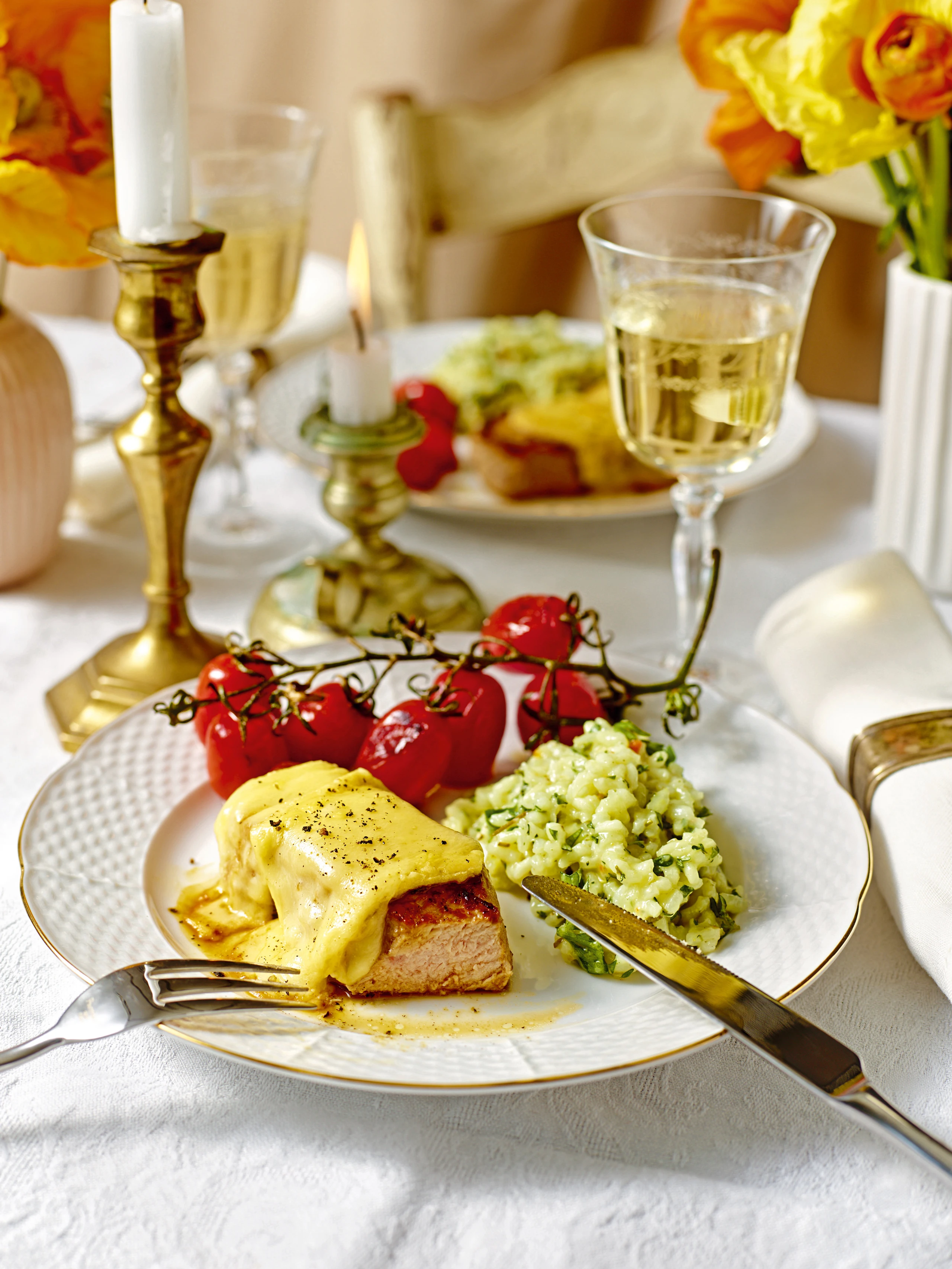 Kalbssteaks mit Raclettekäse und Kräuterrisotto