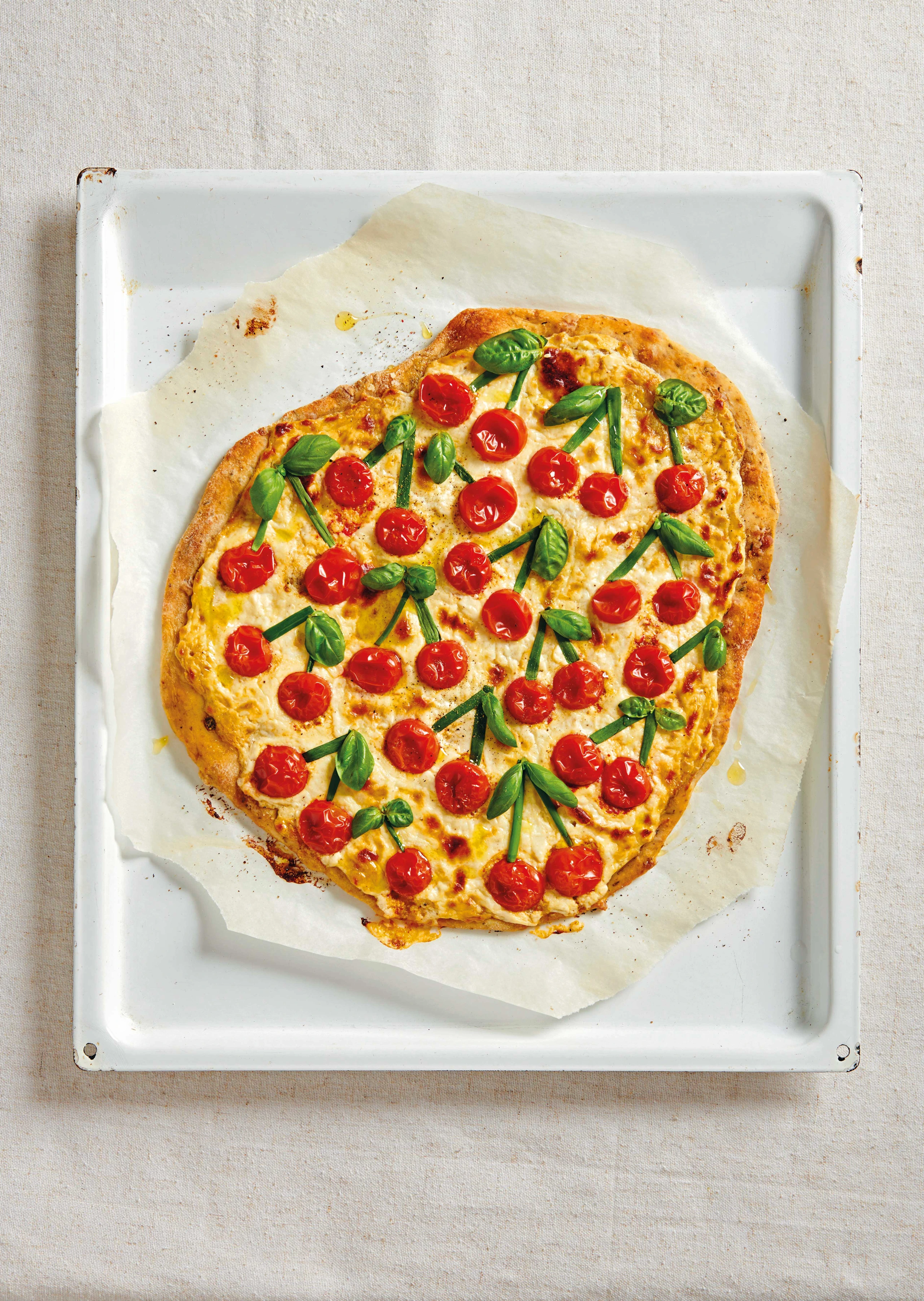 Cheesy Flammkuchen mit Paradeisern