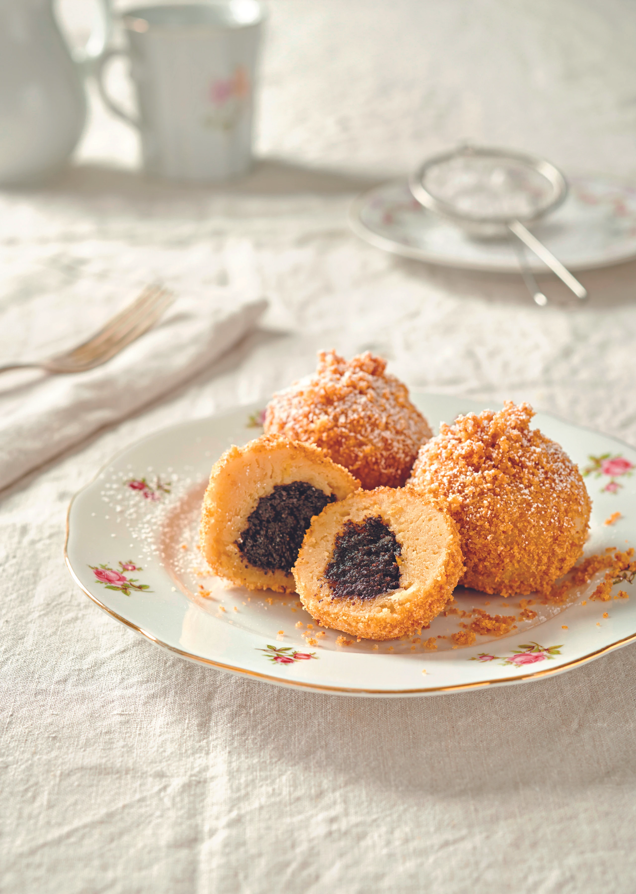 Topfenknödel mit Mohn-Powidlfülle