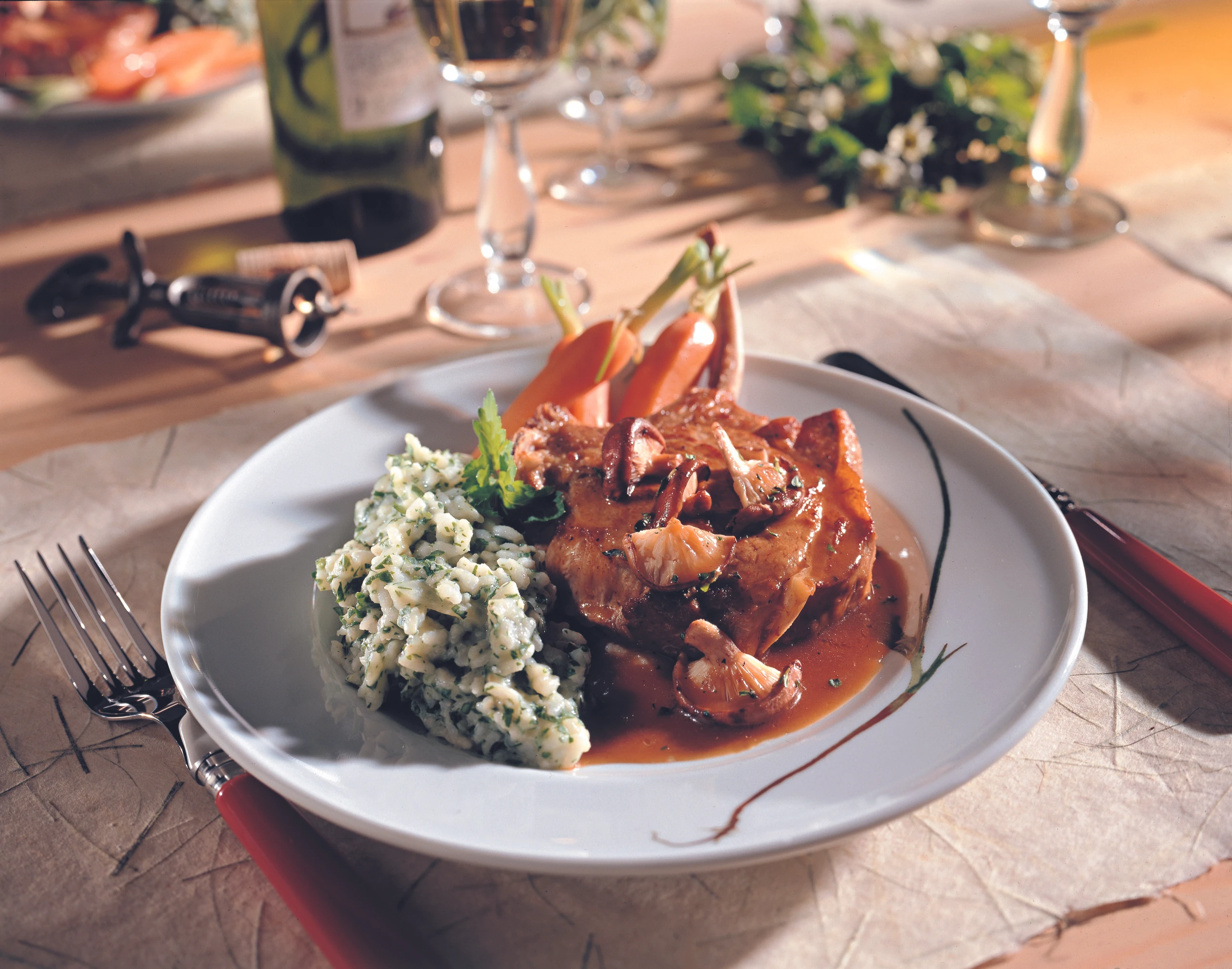 Kalbskoteletts mit Schwammerlsauce und Petersilrisotto