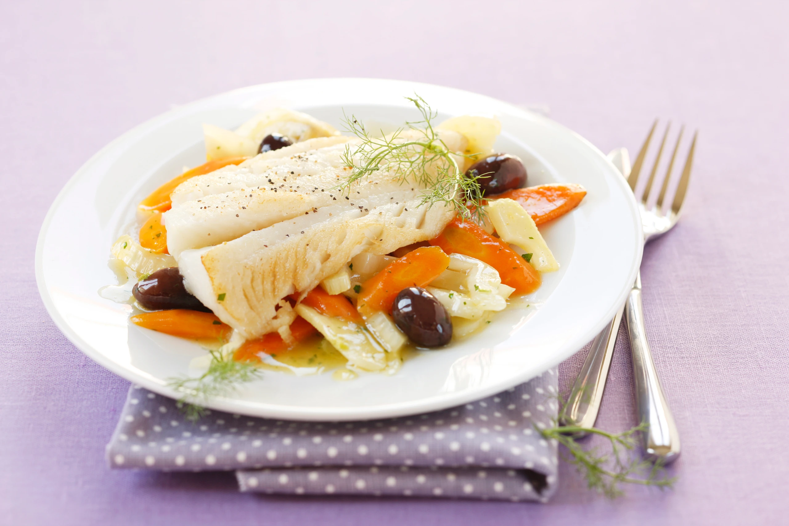 Kabeljaufilet auf Gemüse