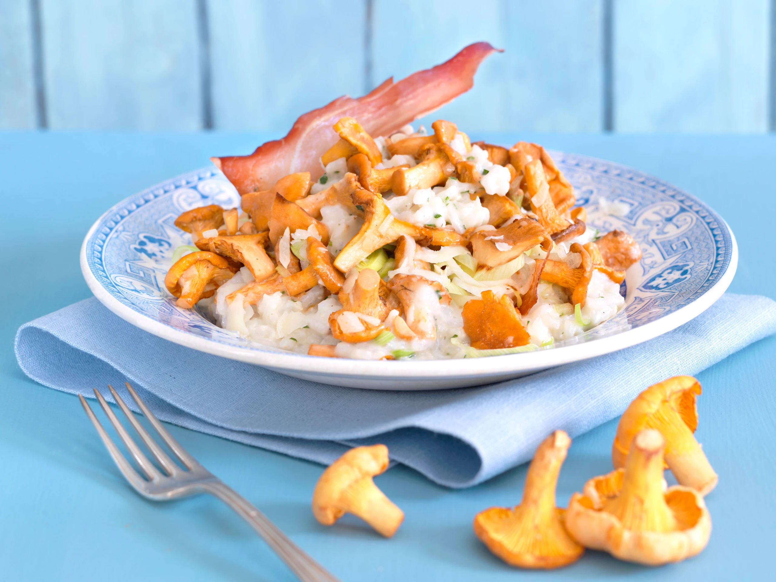 Eierschwammerl-Risotto mit Knusperschinken