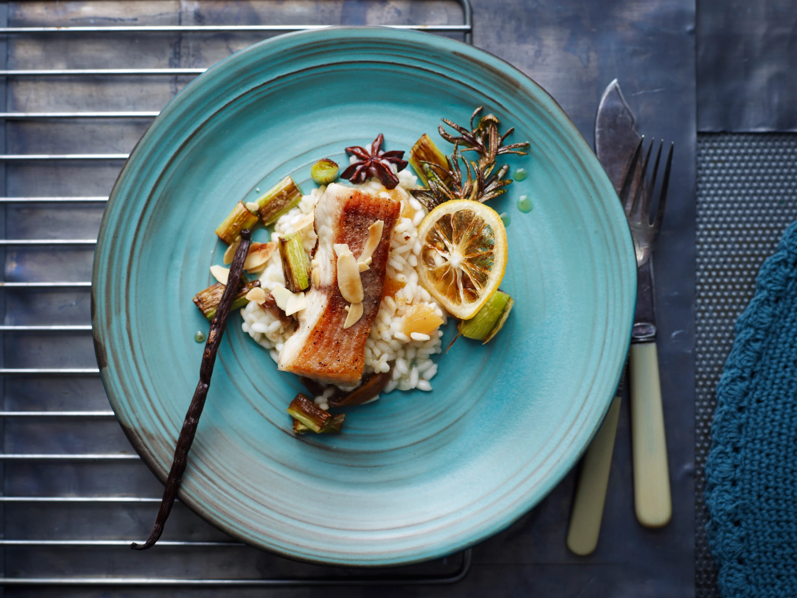Welsfilet mit Gewürzrisotto und Zitrone