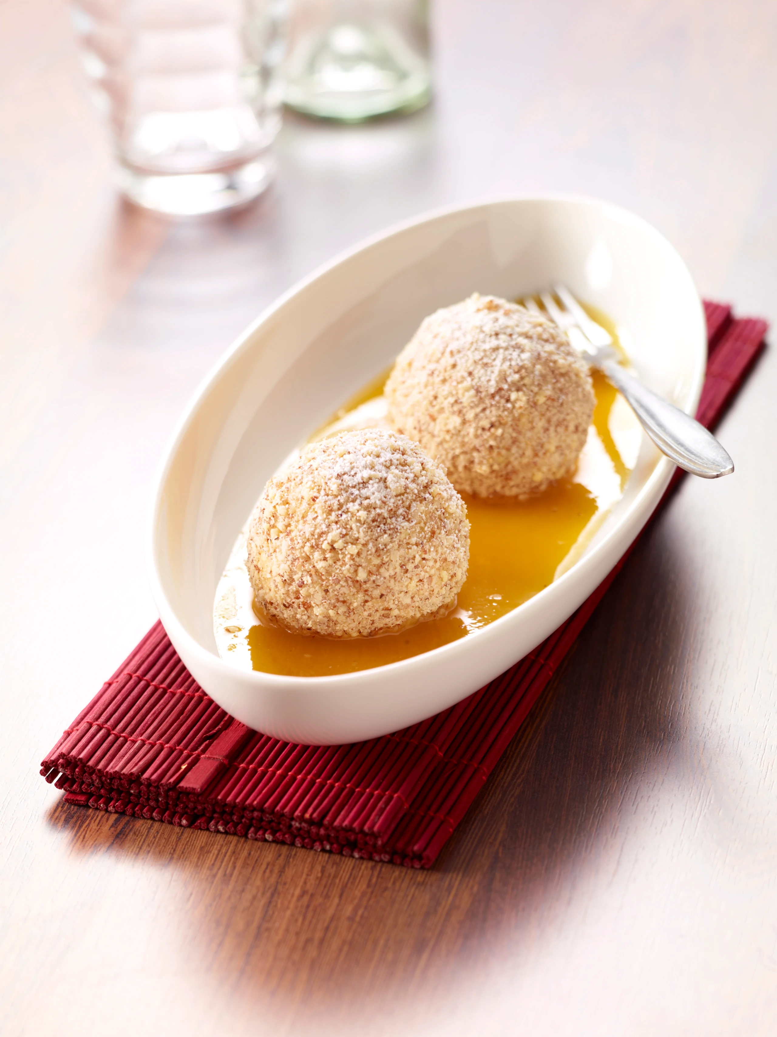 Kastanienknödel mit Orangensauce