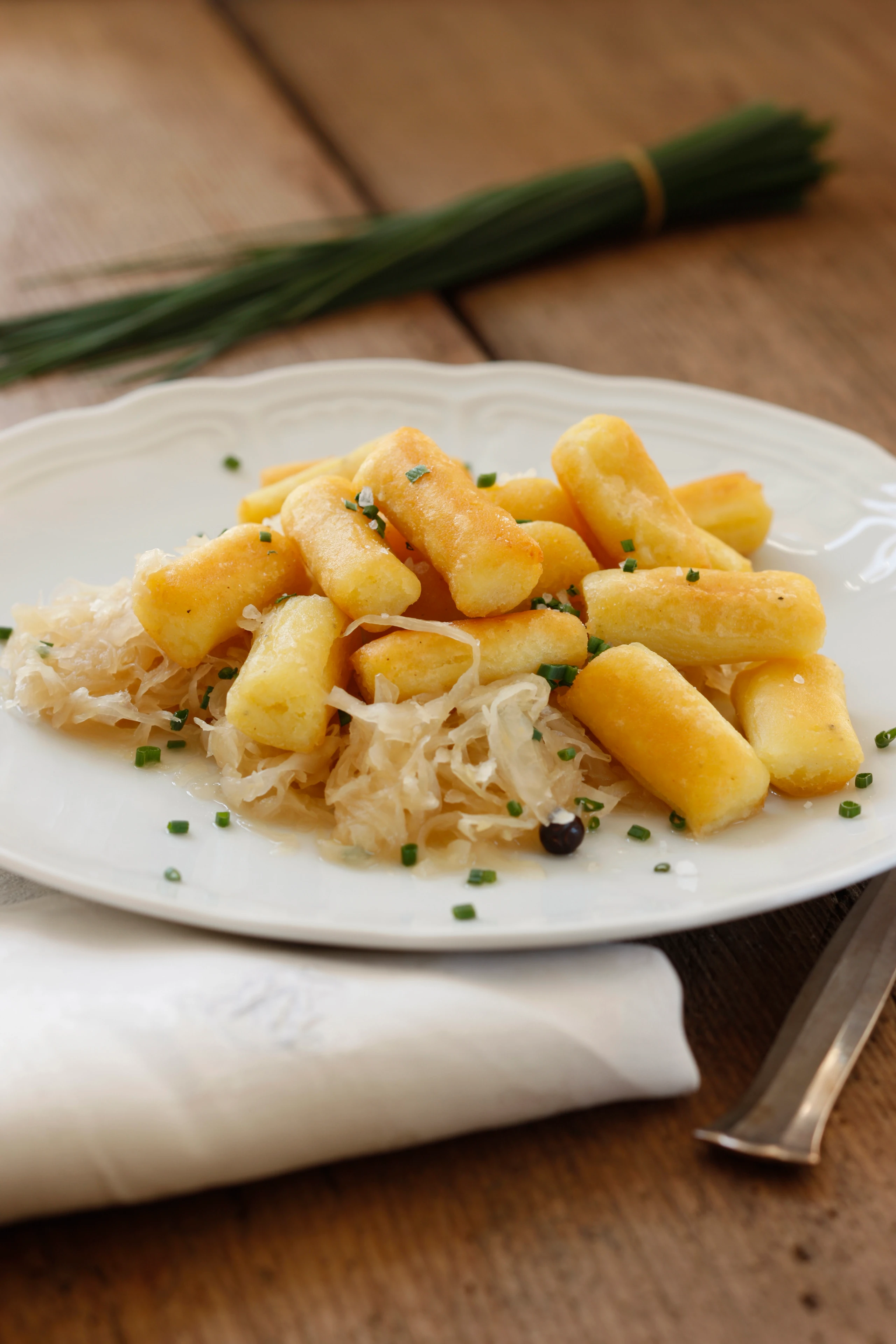 Erdäpfelnidei mit Sauerkraut