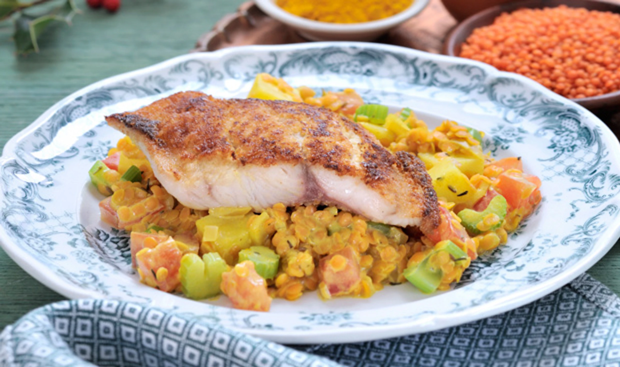 Wels mit Currylinsen und Koriander