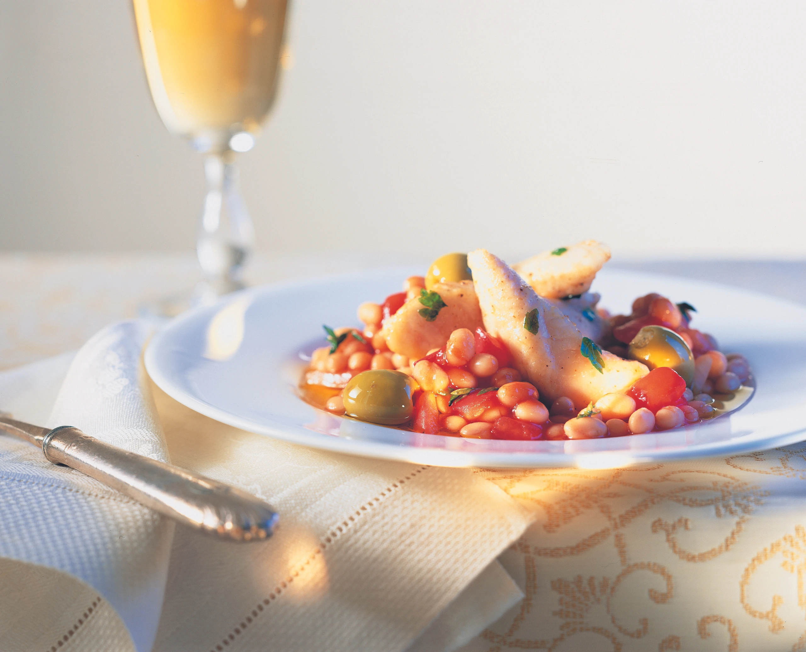 Welsschnitzel auf weißen Bohnen