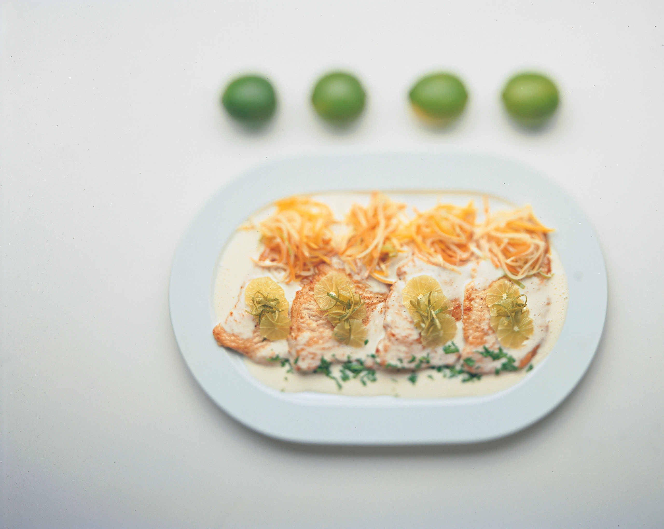 Truthahnschnitzel mit Limettensauce und Wurzelgemüse