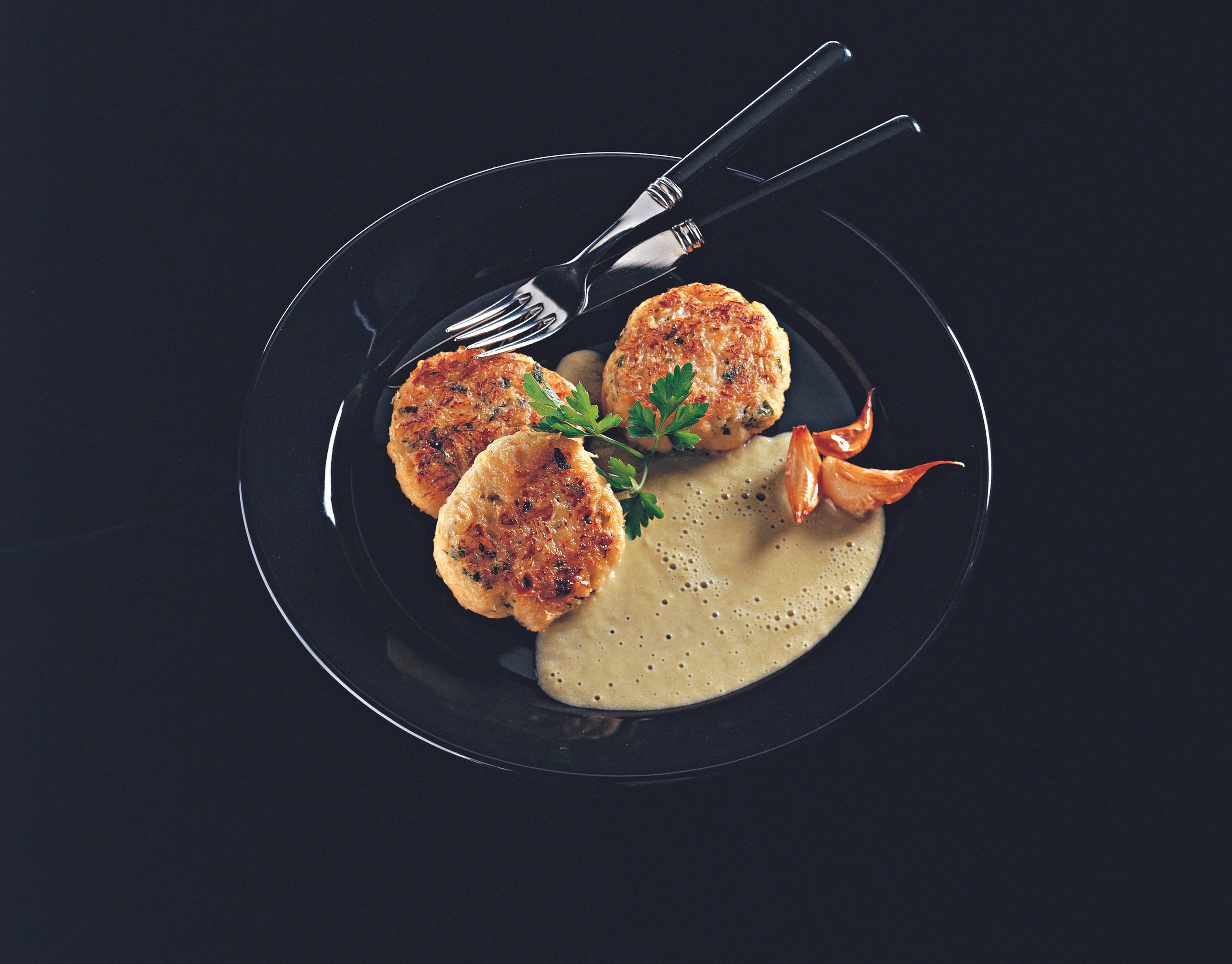 Sauerkraut-Laibchen mit grüner Paprikasauce