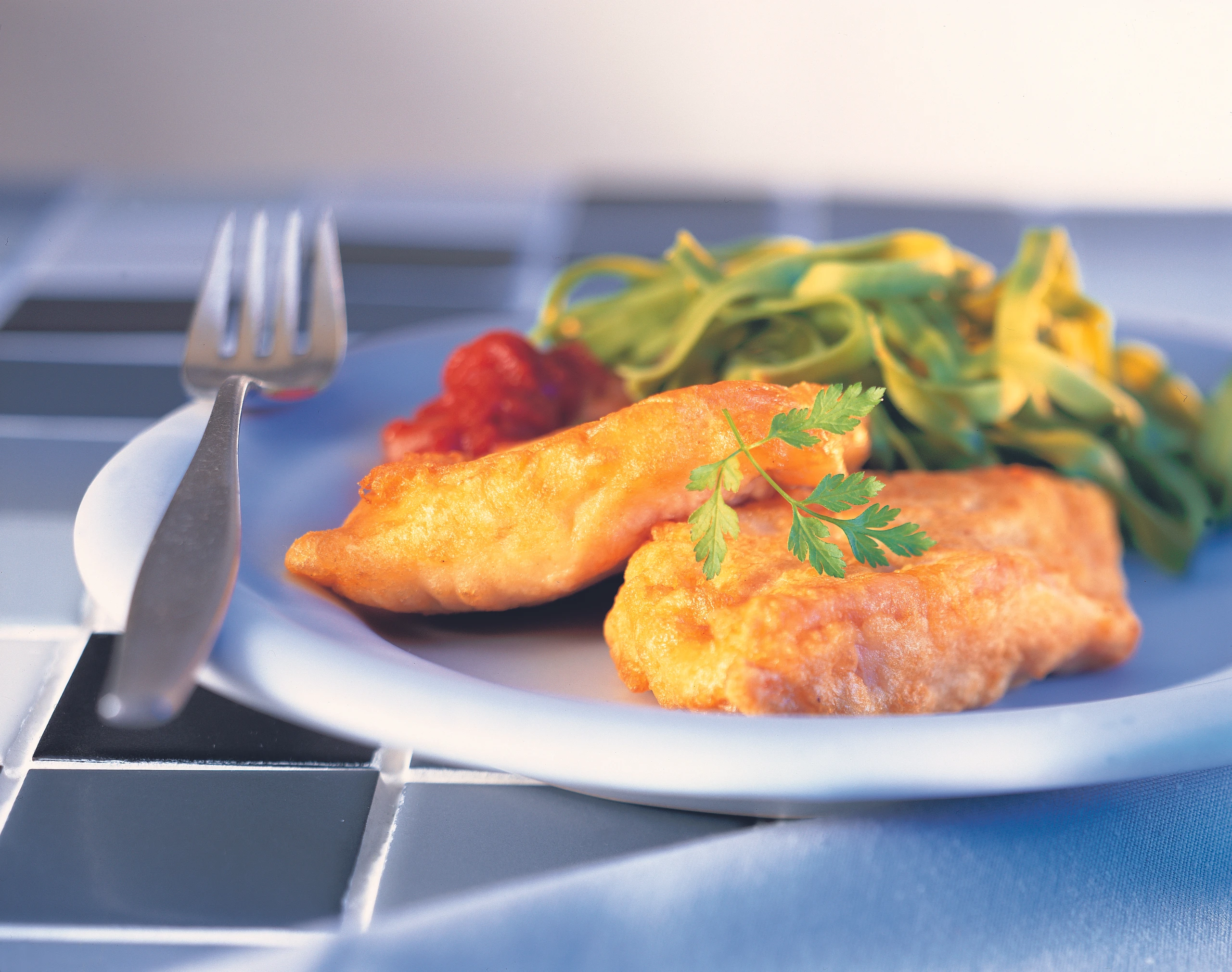 Piccata milanese von der Forelle mit Paradeissauce