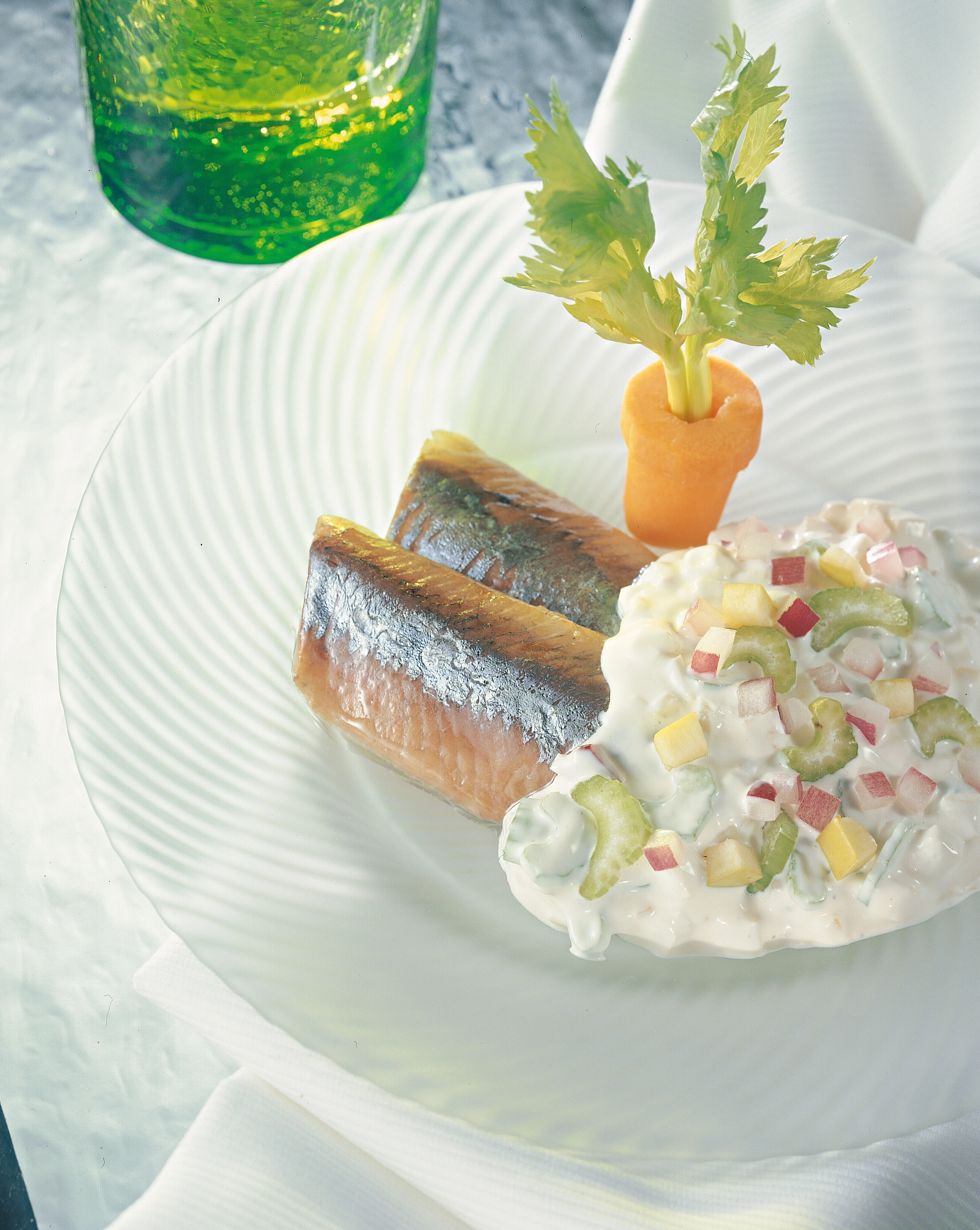 Matjesfilets mit Zwiebel-Rahmsauce