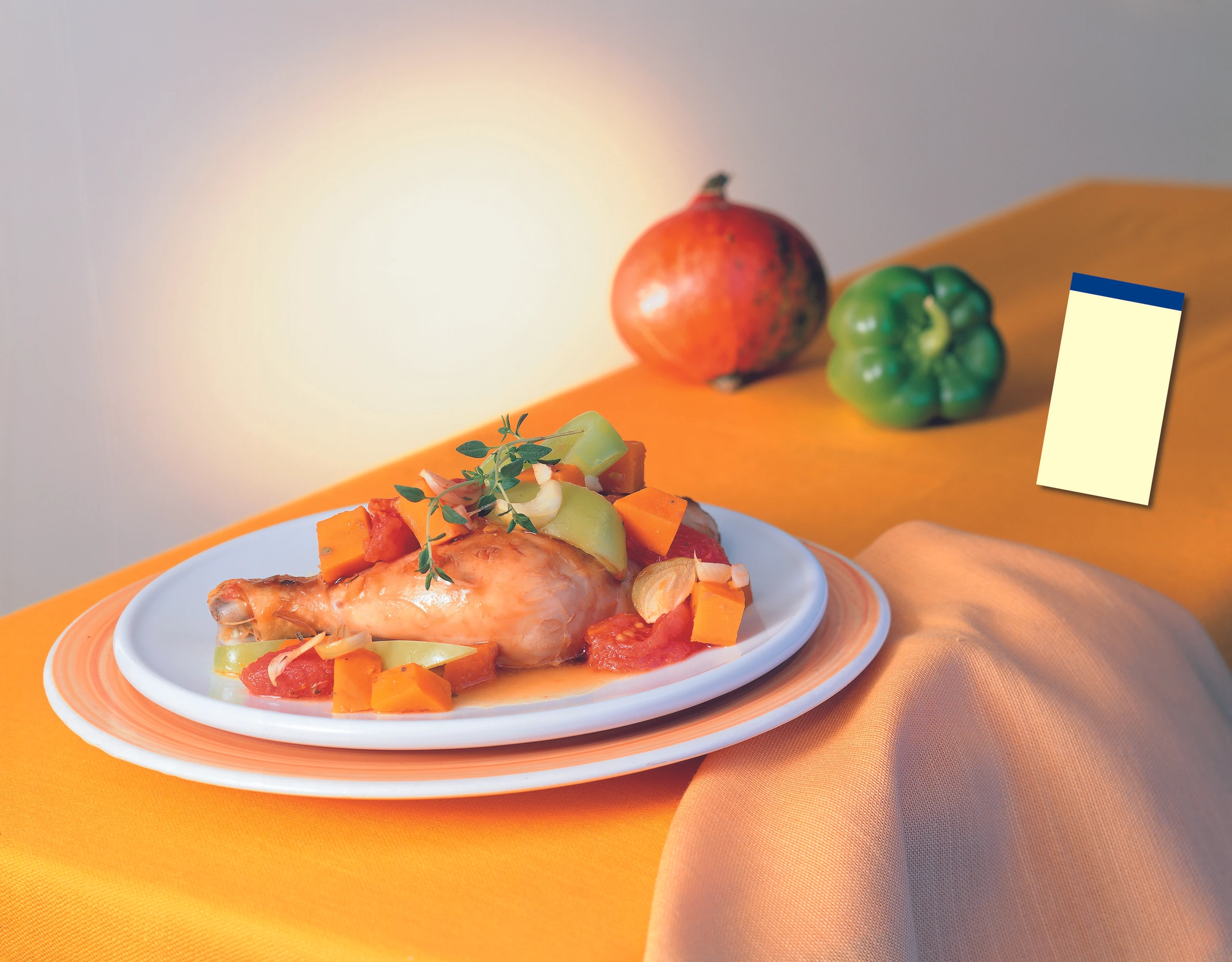 Kreolische Hühnerkeulen mit Kürbis