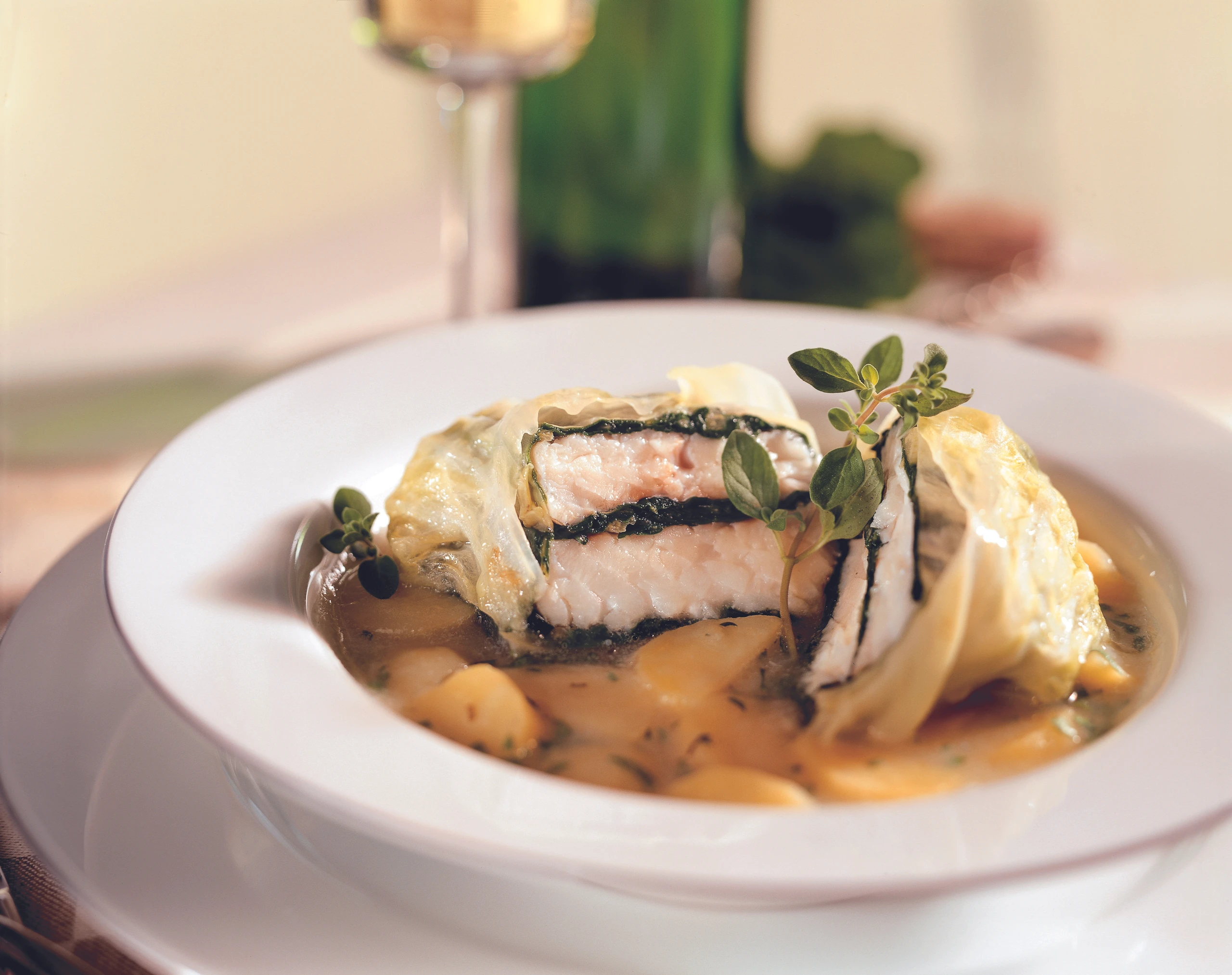 Heilbutt-Krautroulade im Erdäpfelfond