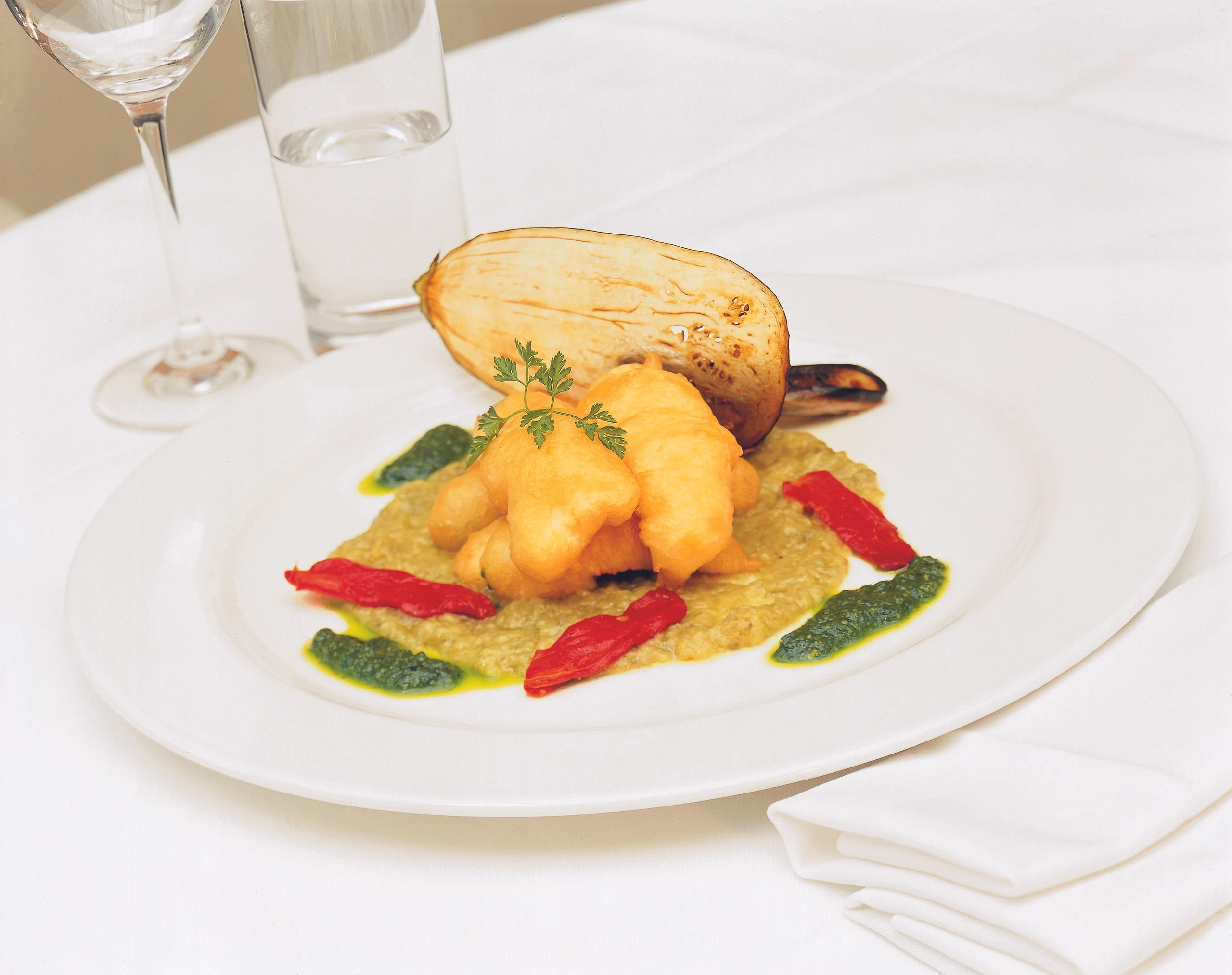 Seezungenbeignets mit Melanzani-Kaviar