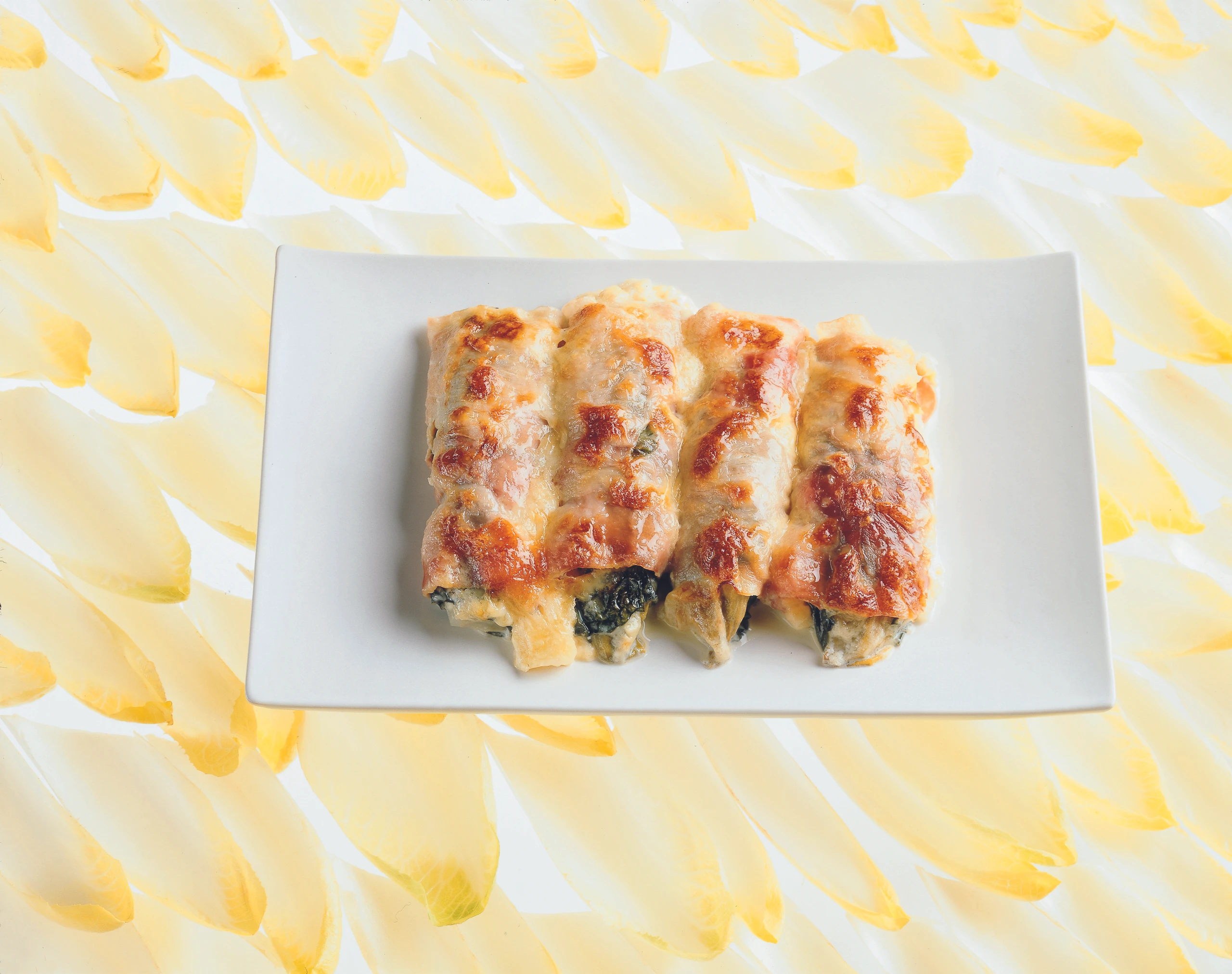 Überbackene Chicorée-Mangold-Röllchen