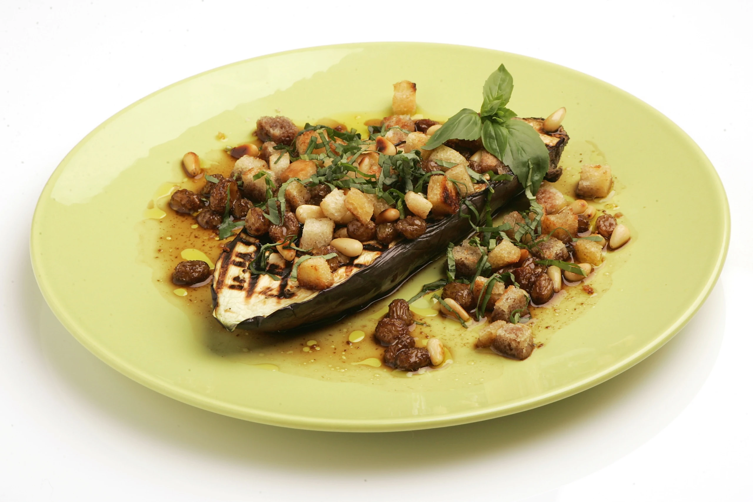 Melanzani mit Pignolikrusteln