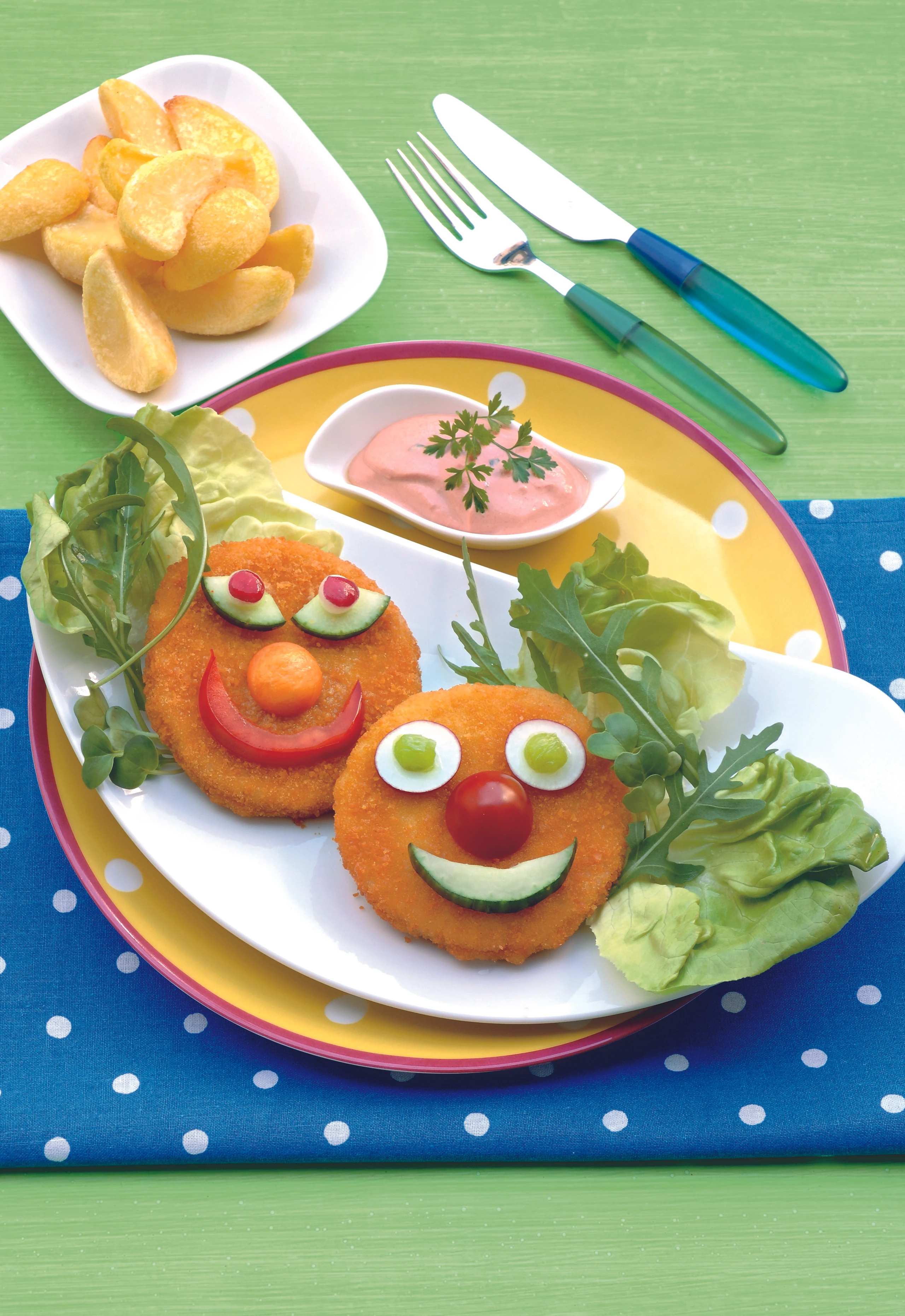Burger-Clowns mit Erdäpfel-Wedges
