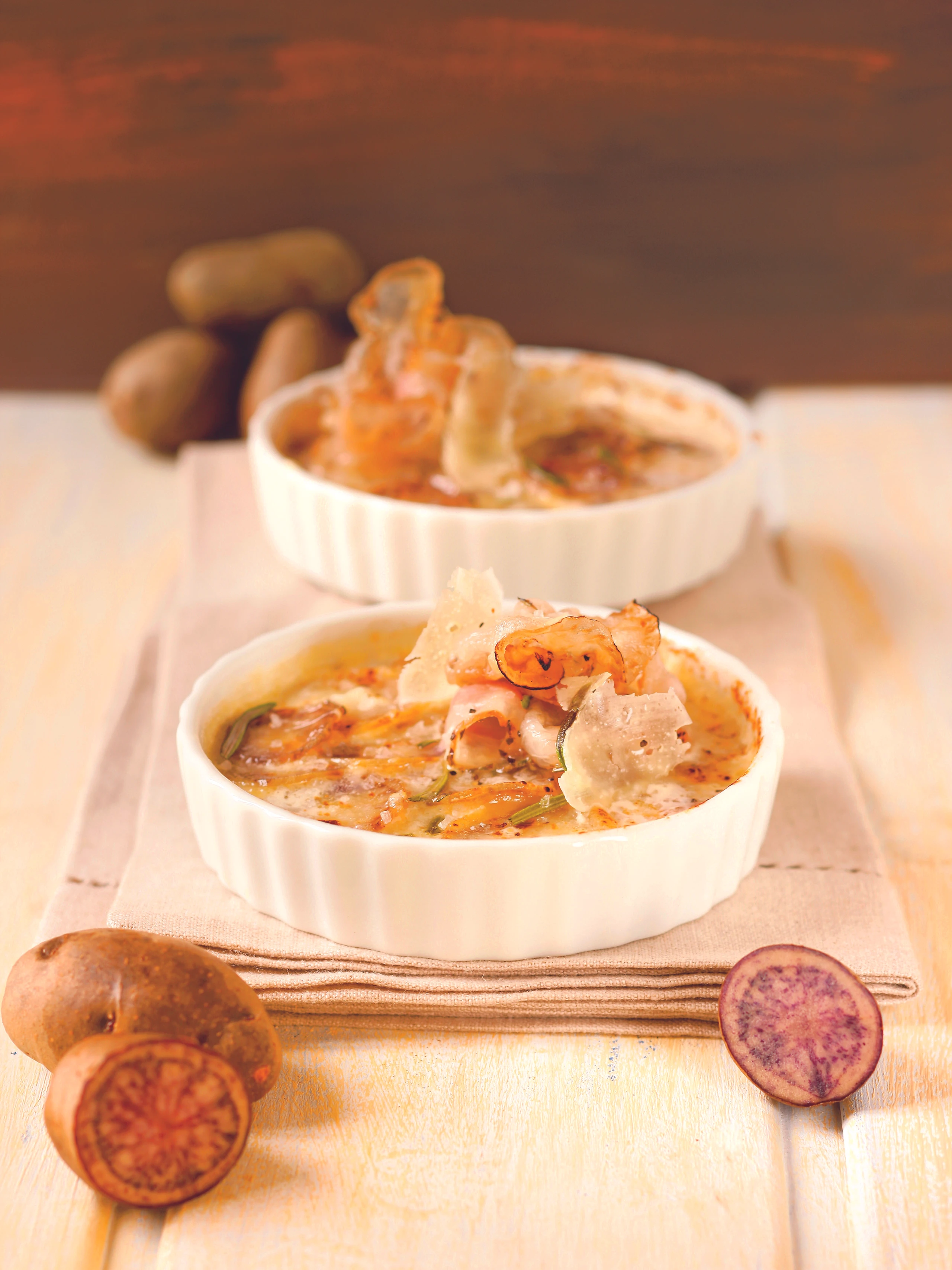 Erdäpfelgratin mit Pecorino und Lardo