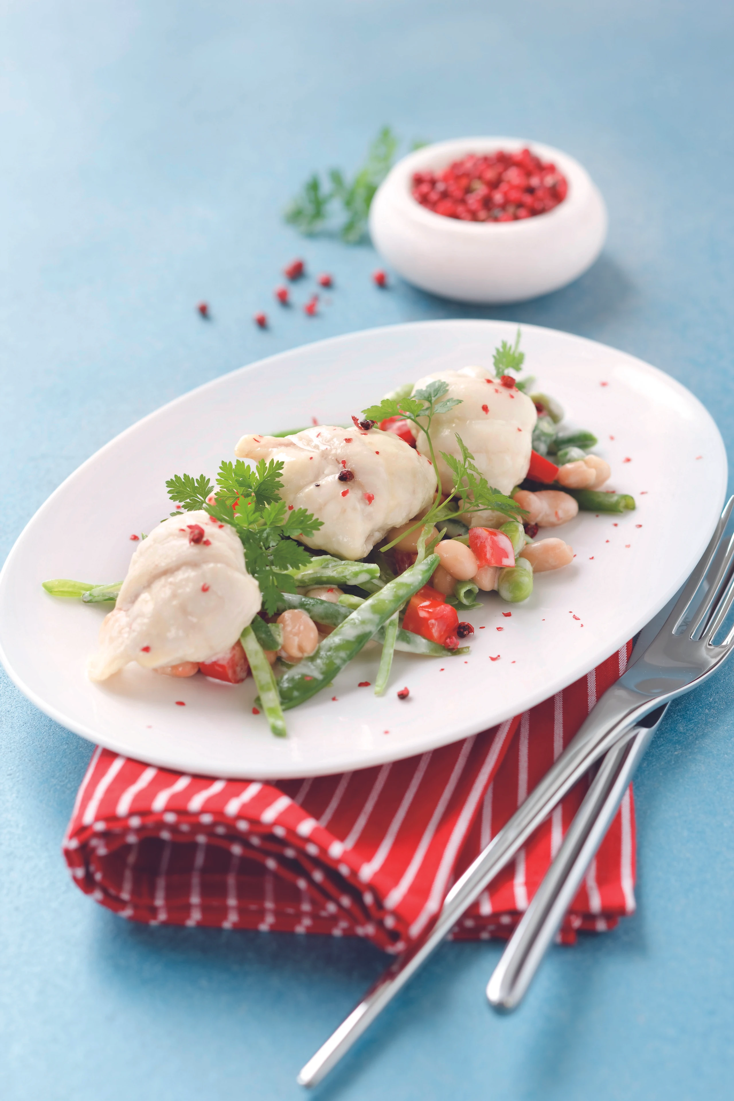 Seezungenröllchen auf Bohnengemüse