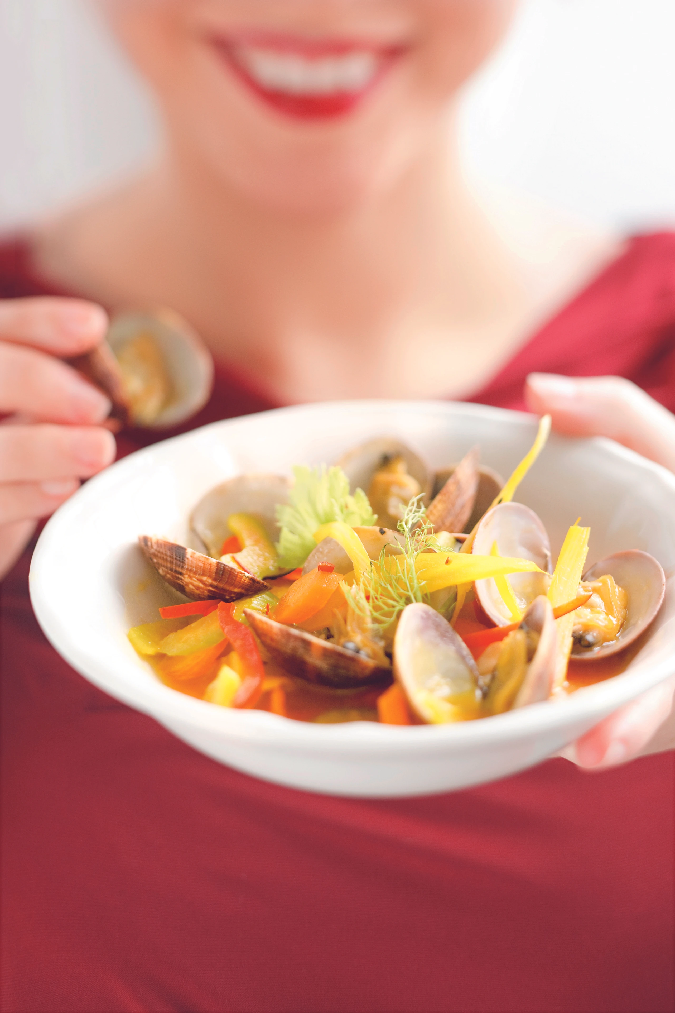 Venusmuscheln in Safran-Gemüsefond