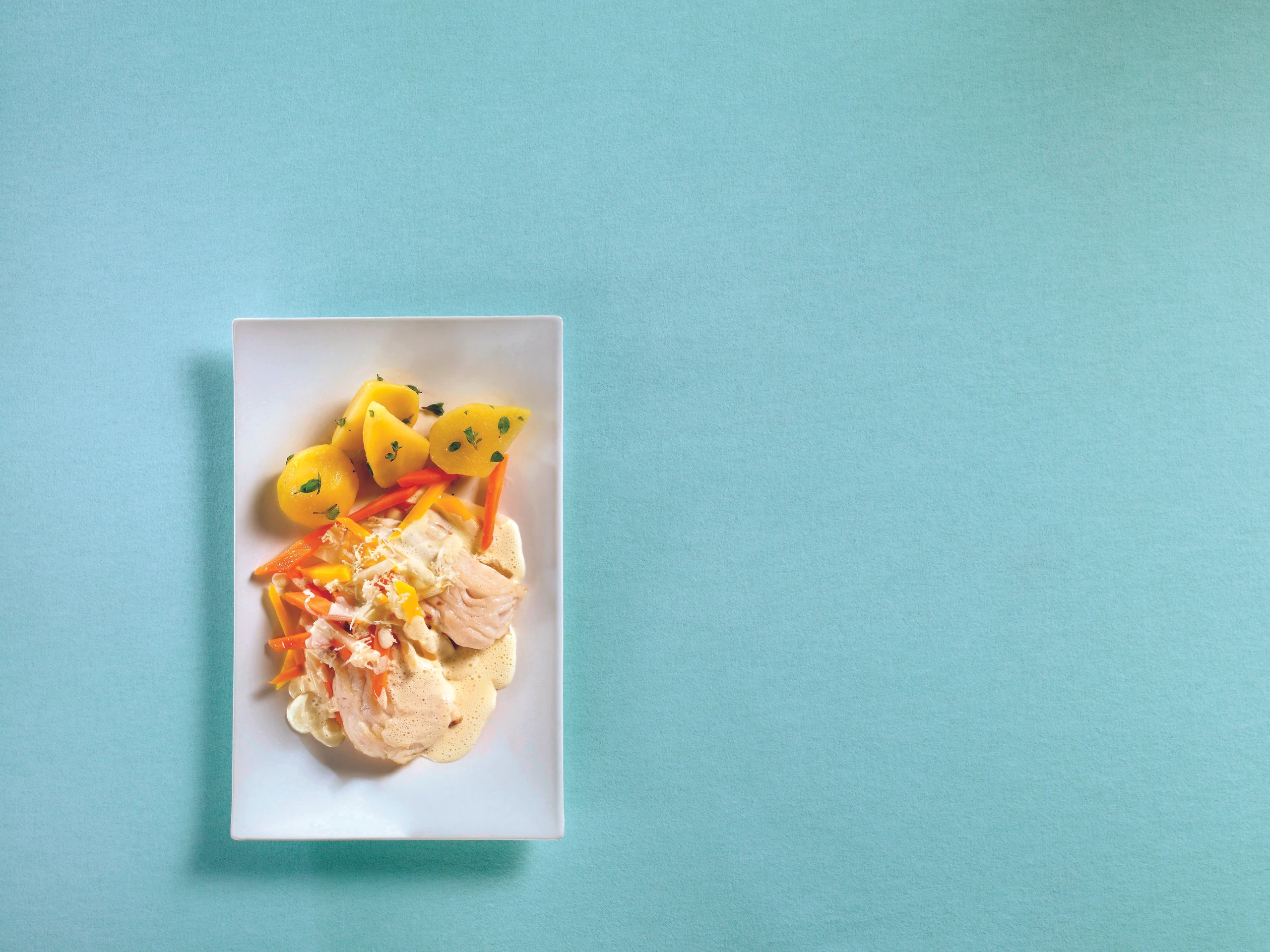 Welsfilet mit Wurzelgemüse und Krensauce