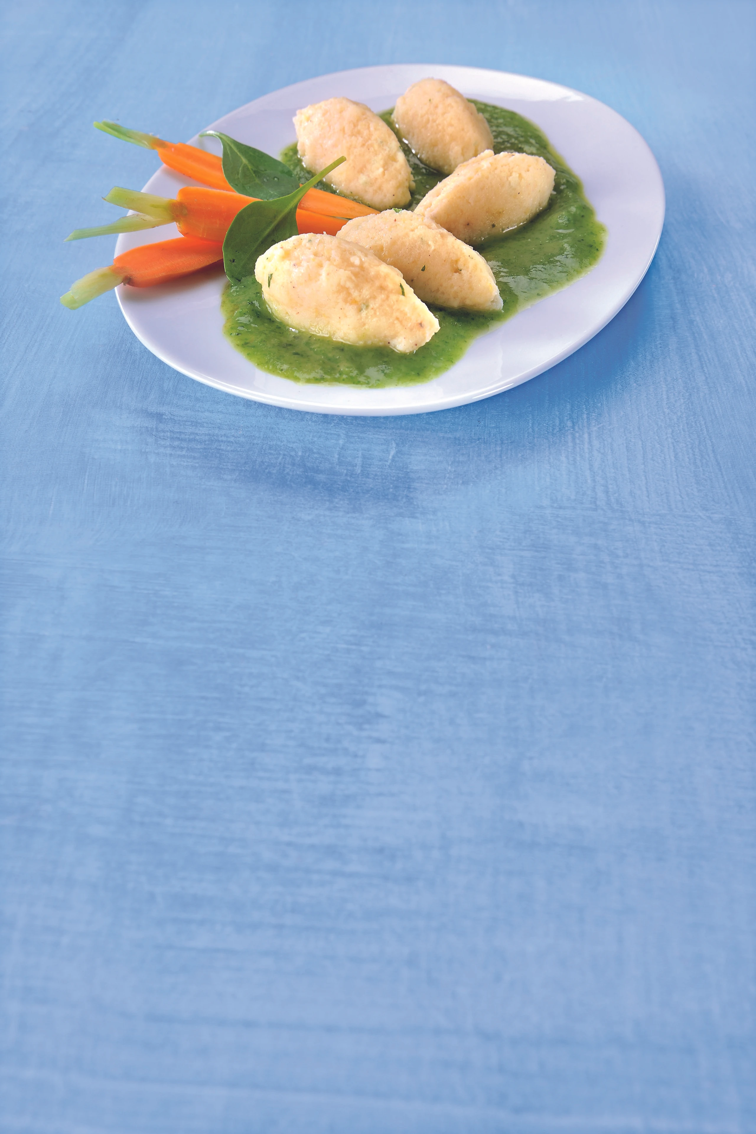 Fischnockerl mit Lauch-Spinat-Sauce