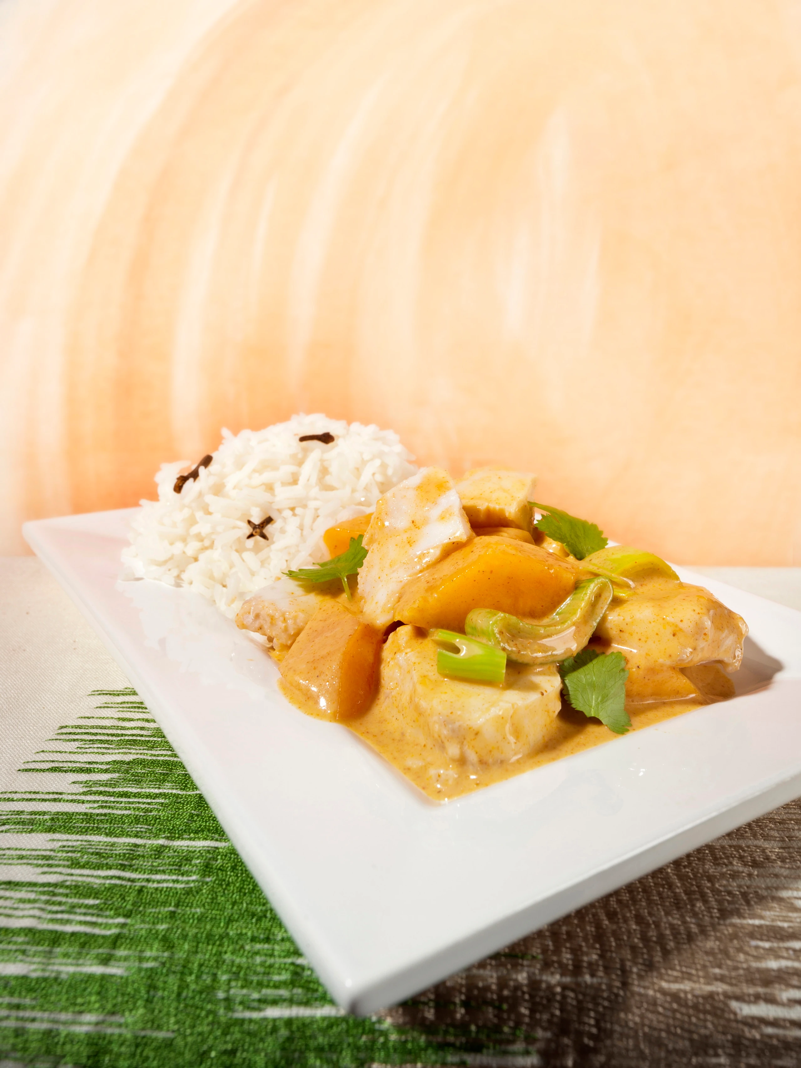 Fischcurry mit Kürbis und Gewürzreis