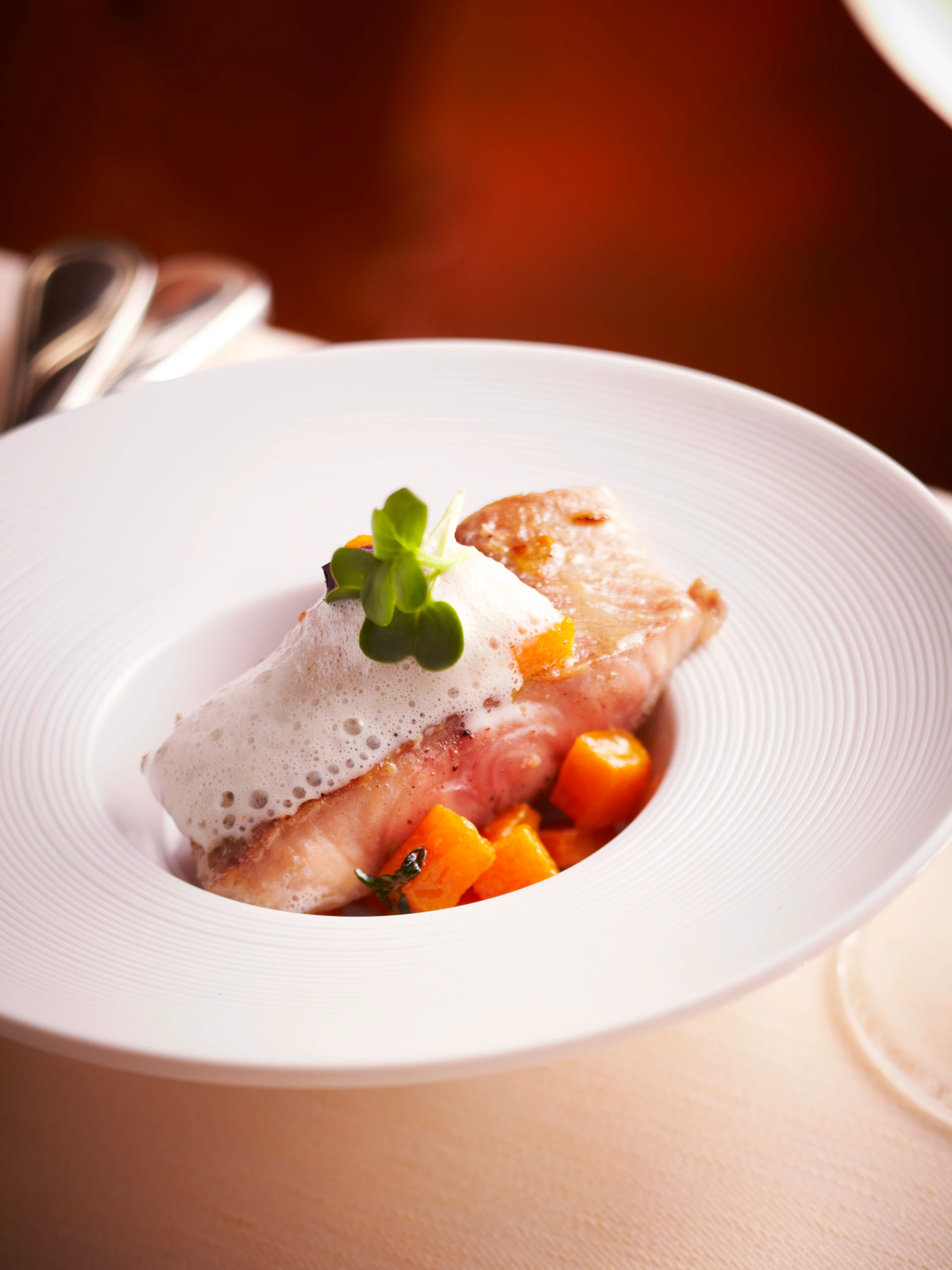 Welsfilet mit Speckschaum und Kürbis