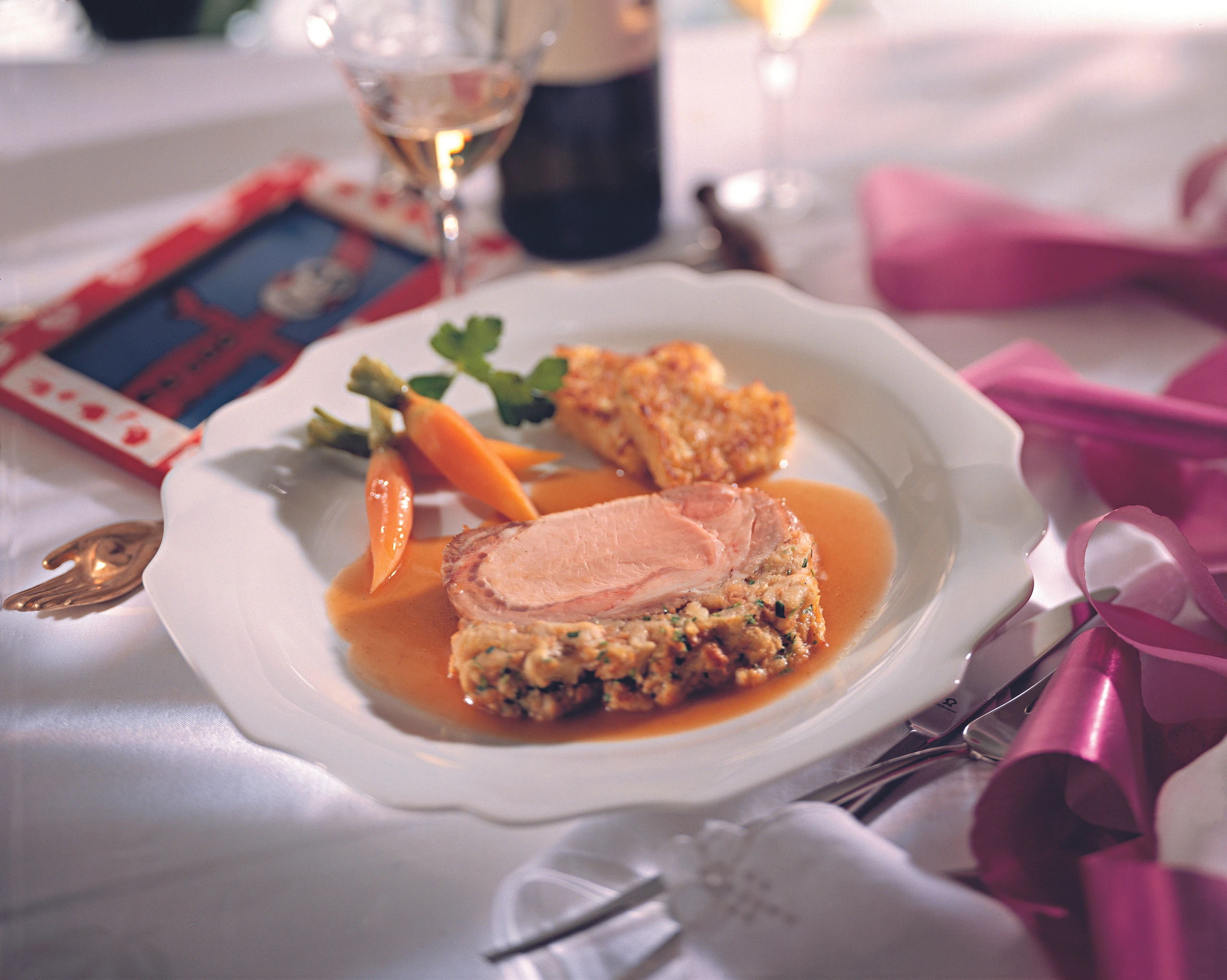 Schweinskarree mit Semmelkruste und Kraut-Krapferln