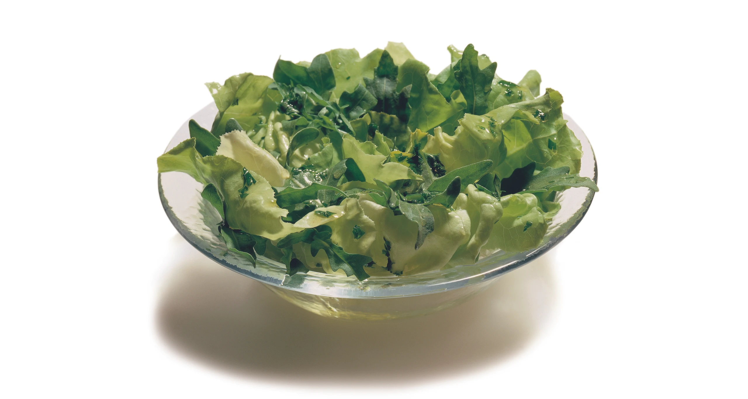 Grüner Salat mit Rucola und Kräuterdressing