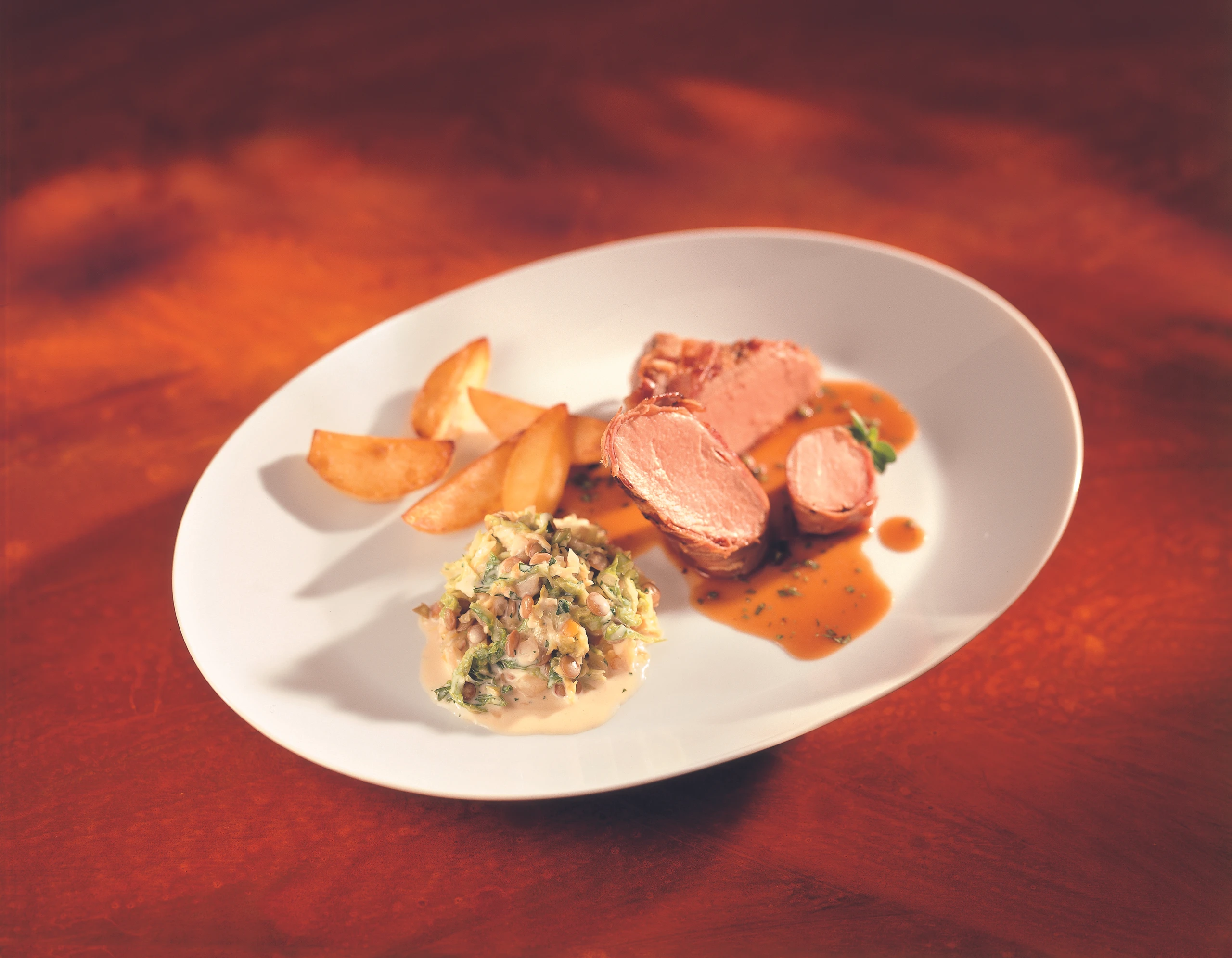 Schweinsfilet mit Rohschinken und Majoransauce