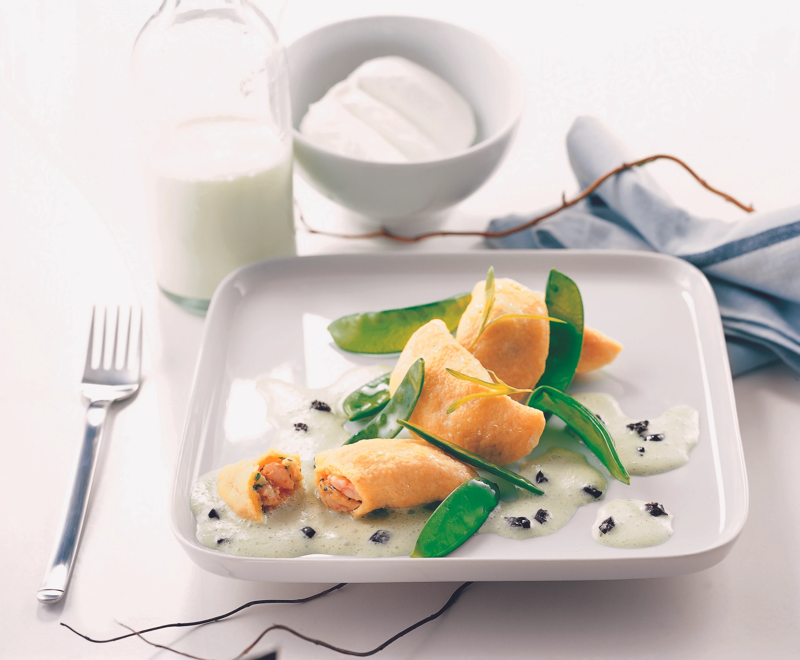 Shrimpstascherl mit Estragonsauce