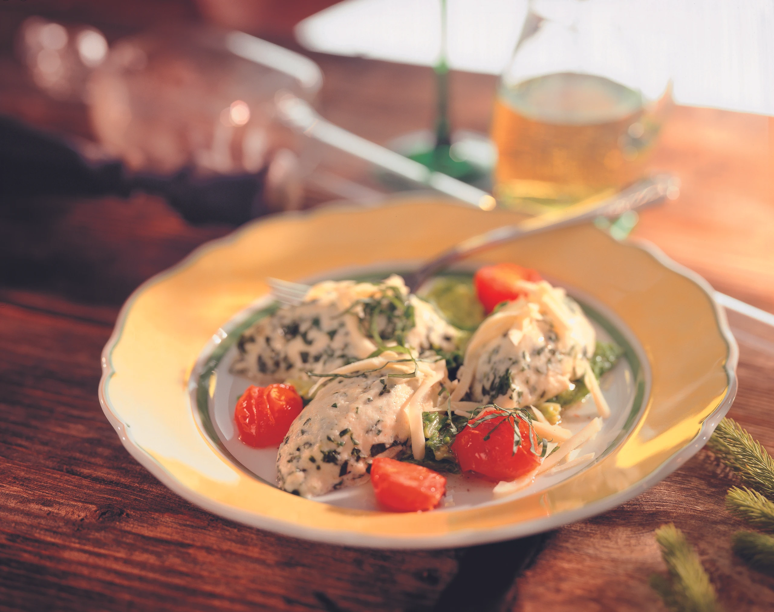 Rucolanockerl mit Paradeisern und Bergkäse