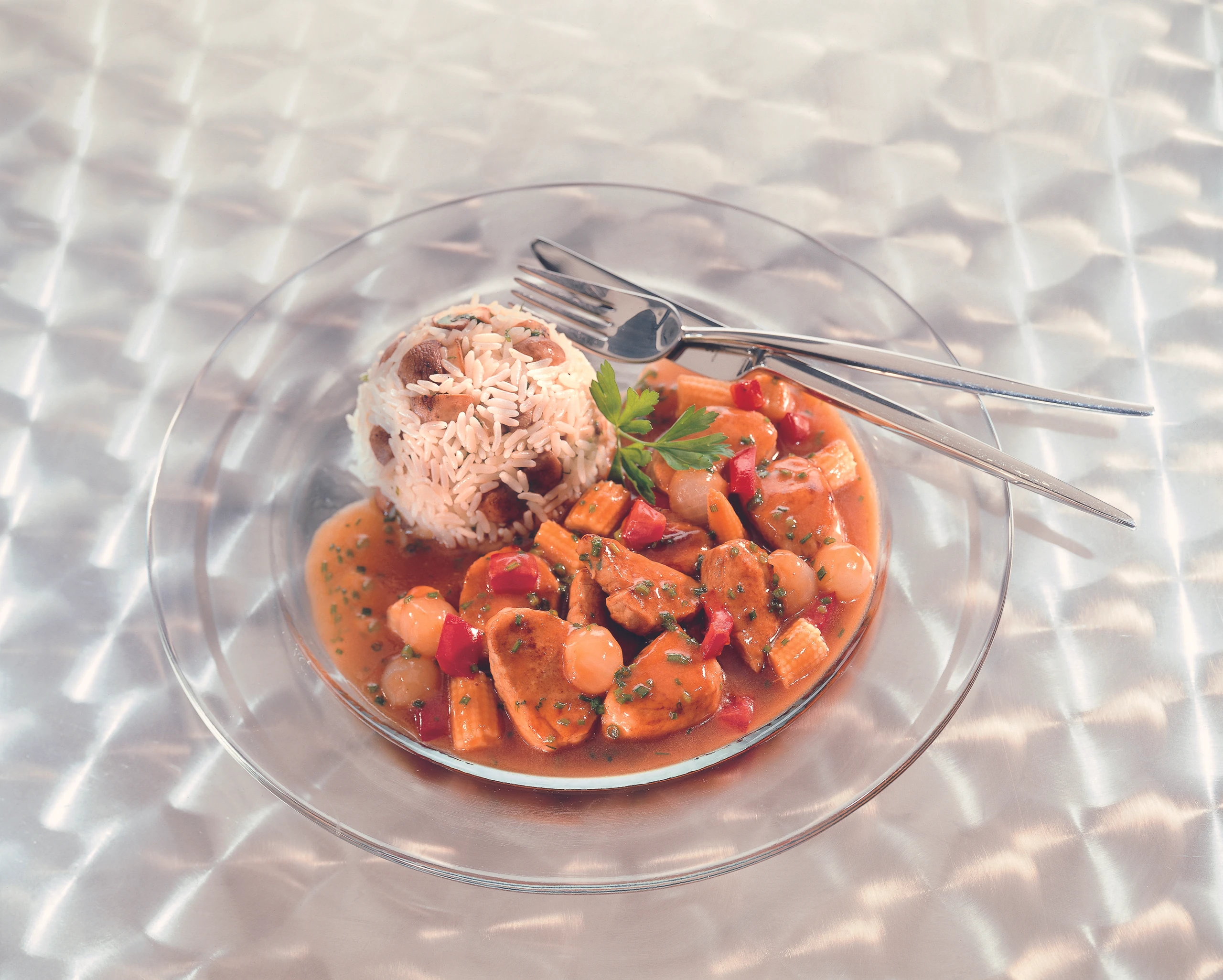 Schweinsfiletwürfel mit Biersauce und Schwammerlreis