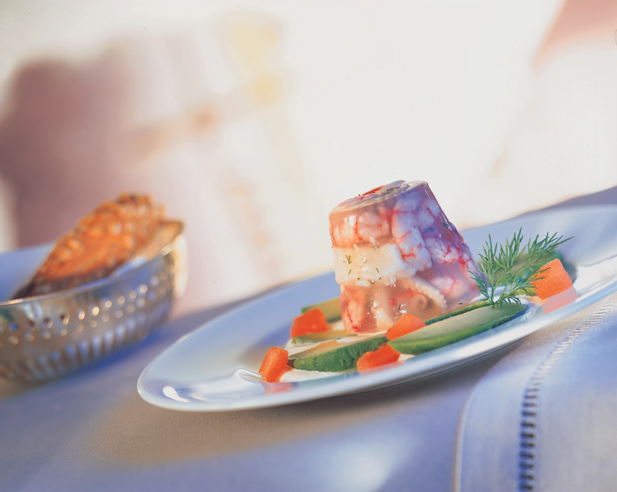 Fischsülzchen mit Meeresfrüchten und Zitronensauce