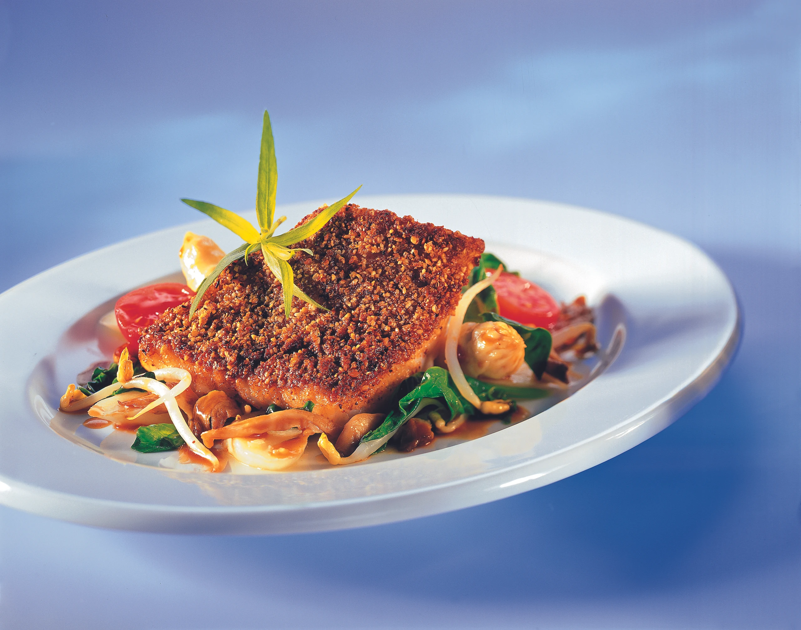 Zander mit Sesam-Nusskruste und Pilzsauce