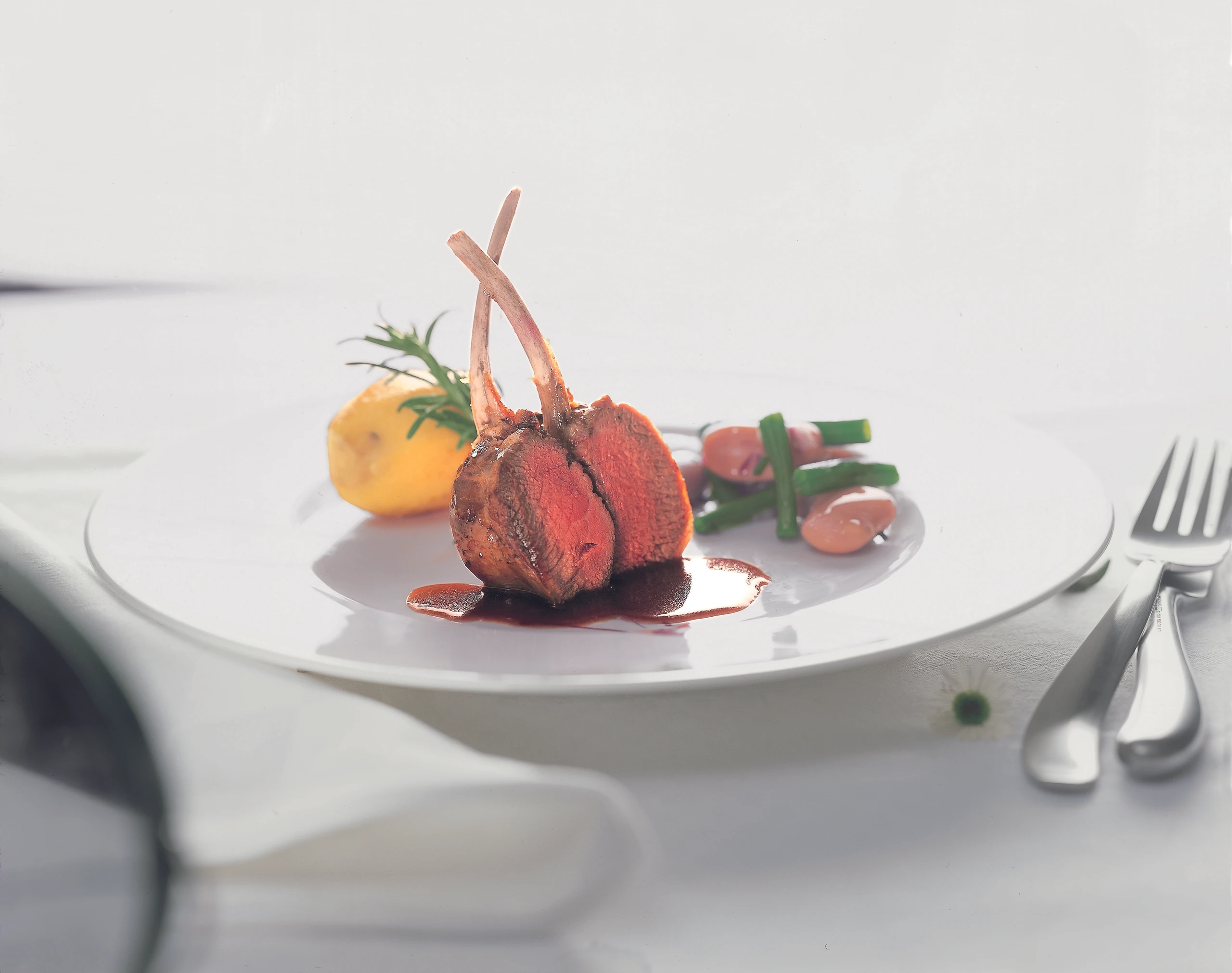 Spalierbraten vom Lamm mit Fisolen Bohnengemüse